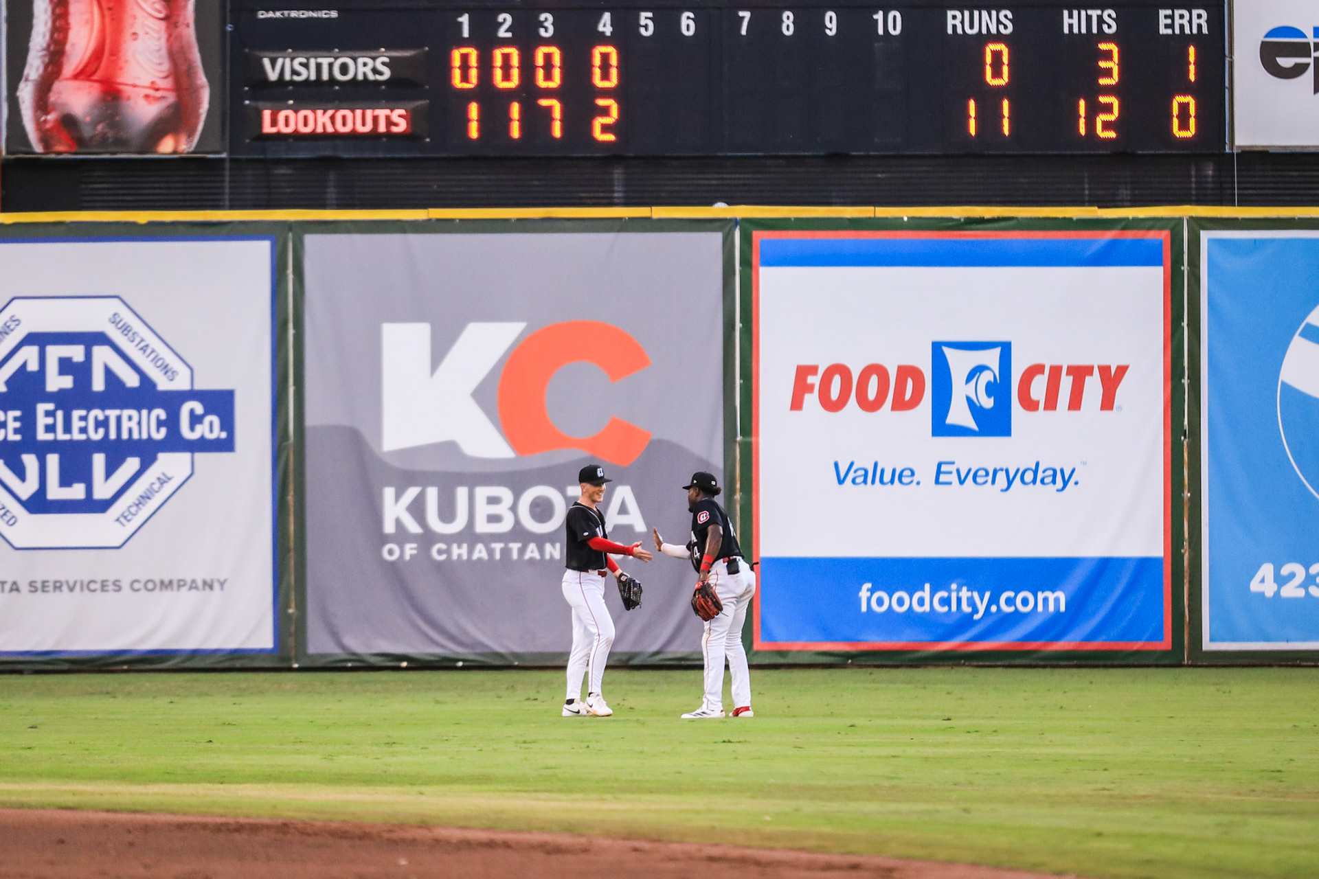 Lookouts vs. Trash Pandas 7.10 - Ethan O'Donnell & Jay Allen celebrating in the outfield