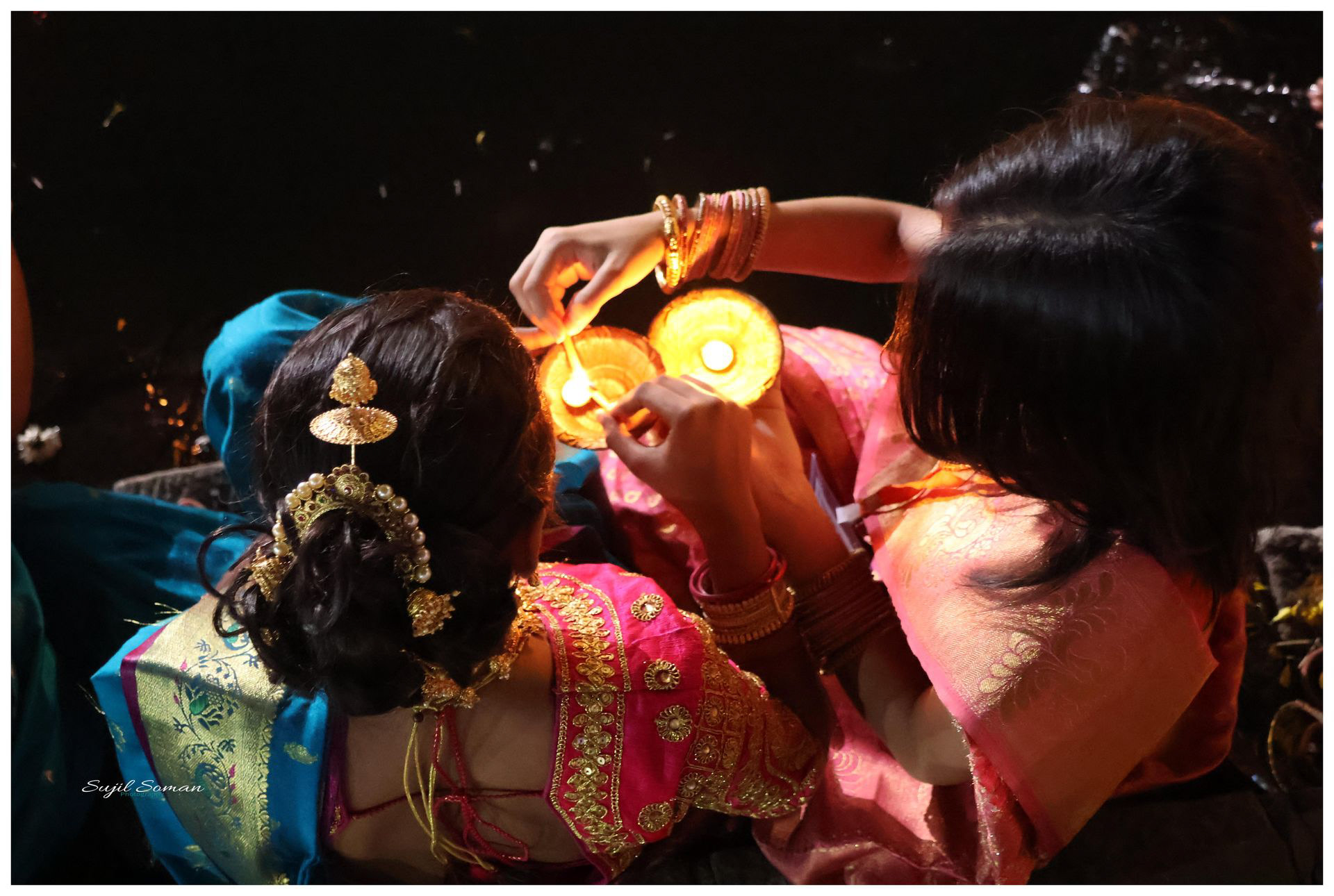 A beautiful moment captured during the Arathi. Sharing the diya of knowledge.