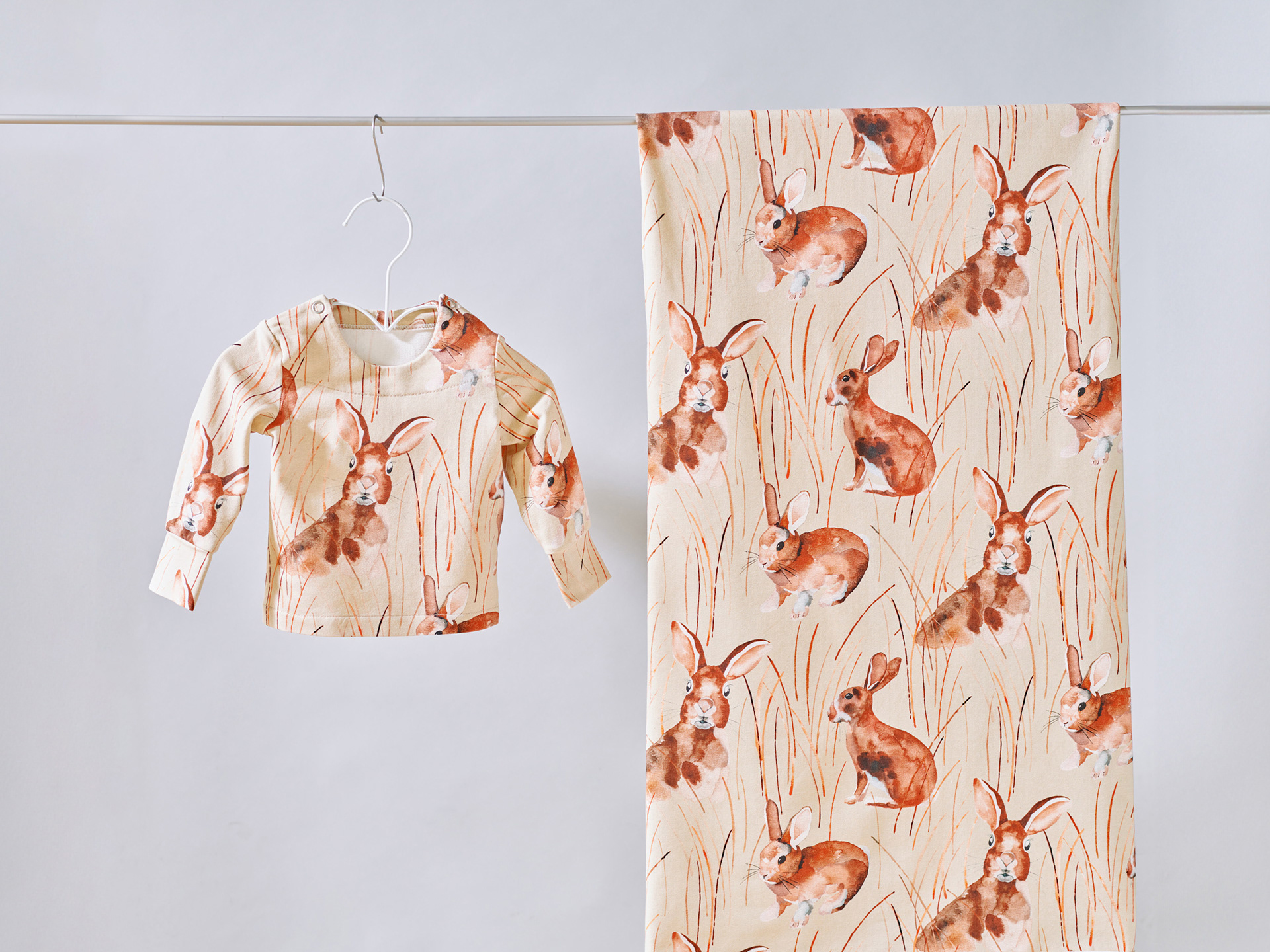 HEINIKOSSA on a college shirt for babies. Photographer: Iiro Rautiainen