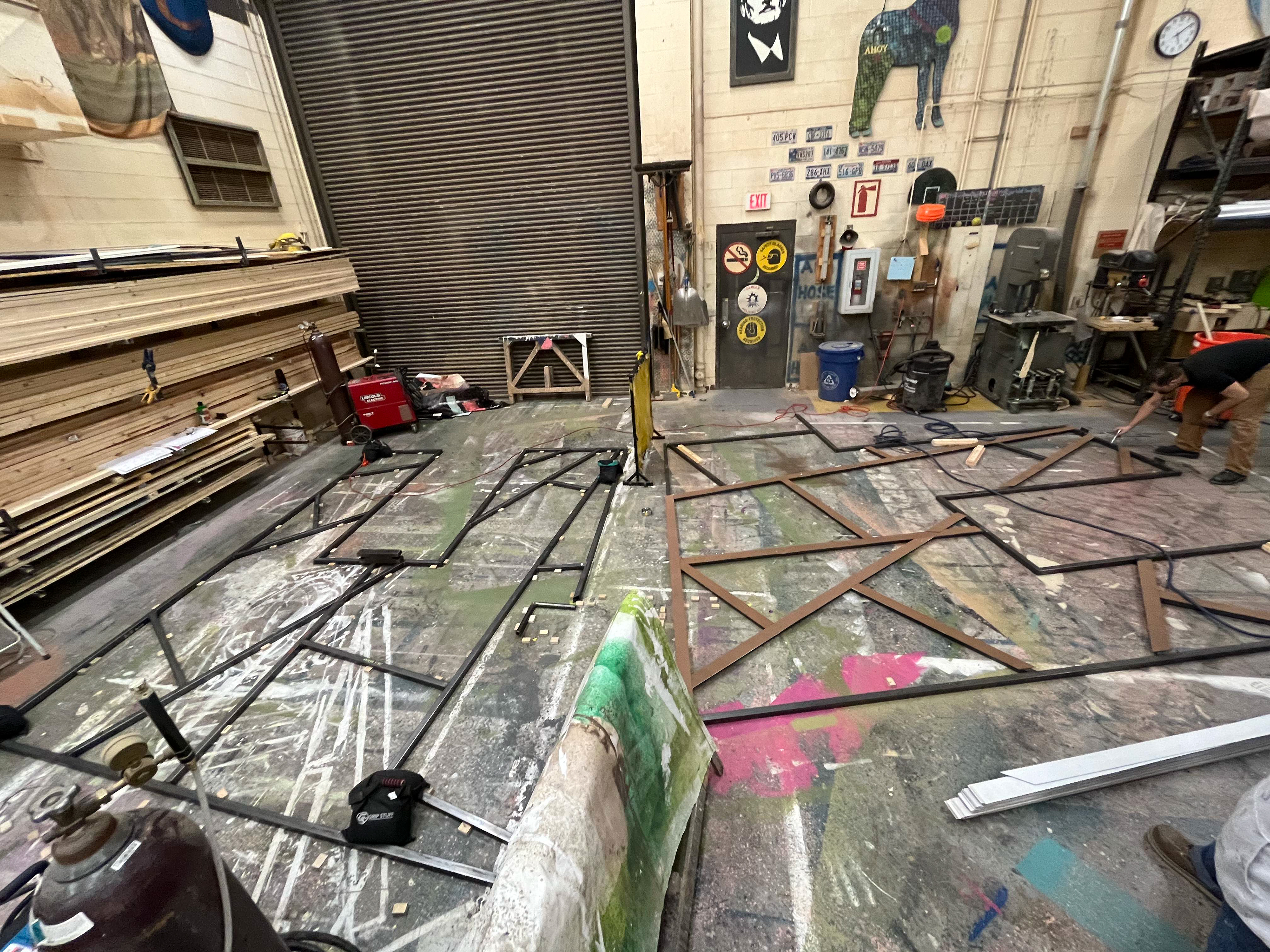 The wall was jigged out & welded in two mirroring halves, then backed with masonite strips.
