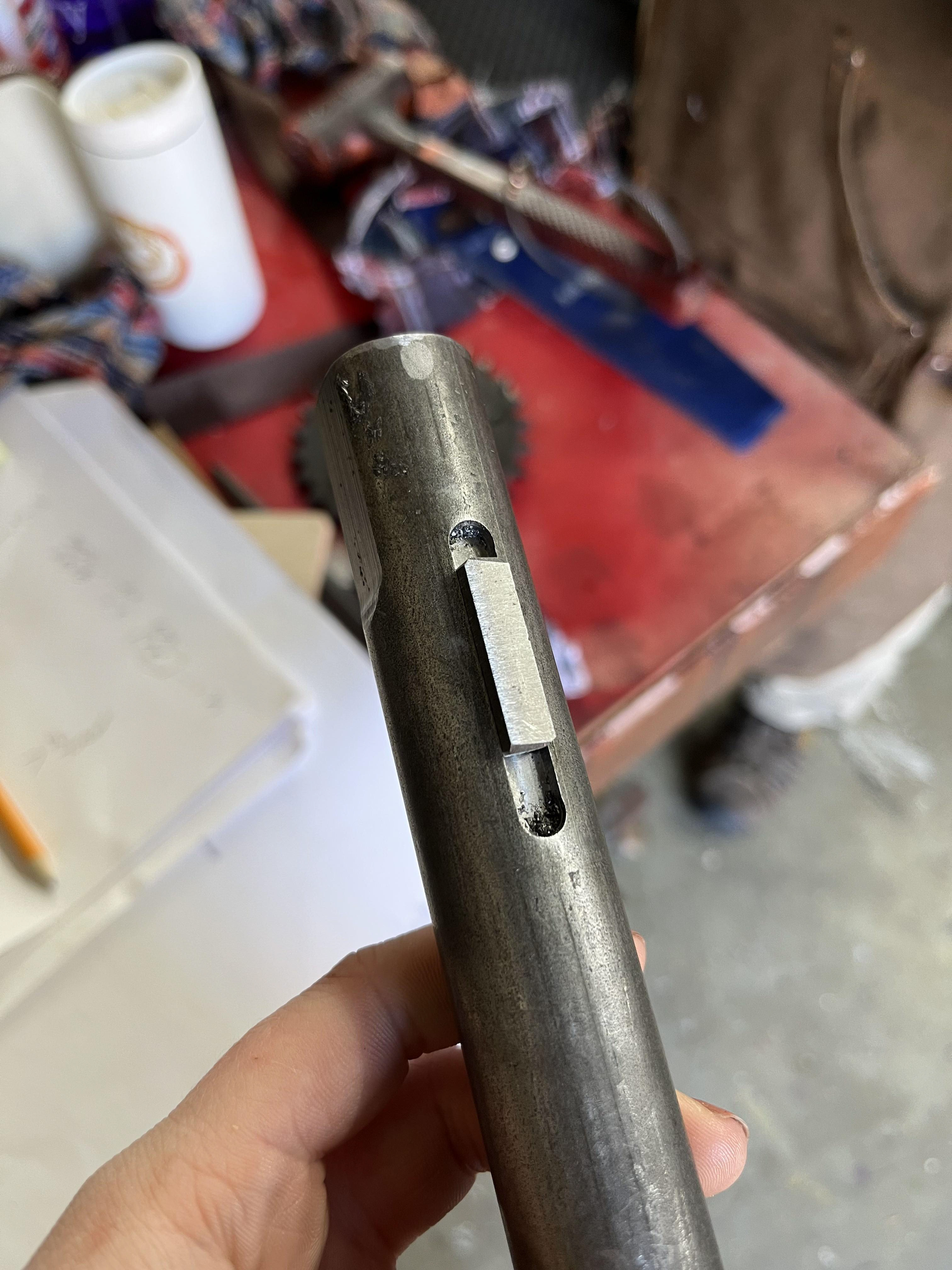 "In Class Shaft" - cut a keyway for a sprocket to sit behind the handle