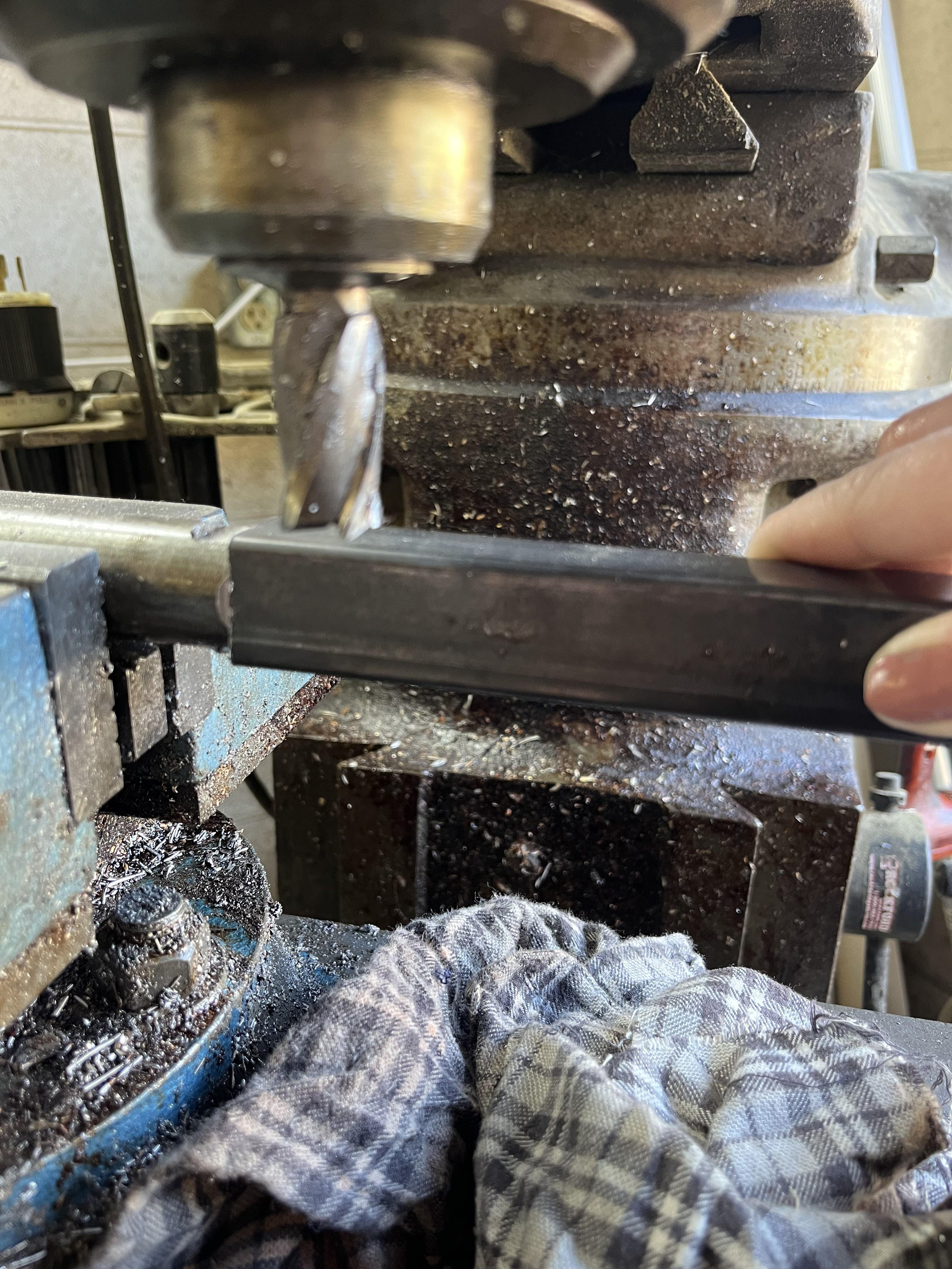 "In Class Shaft" - square off the end of the rod to fit within 1" box tube for a handle