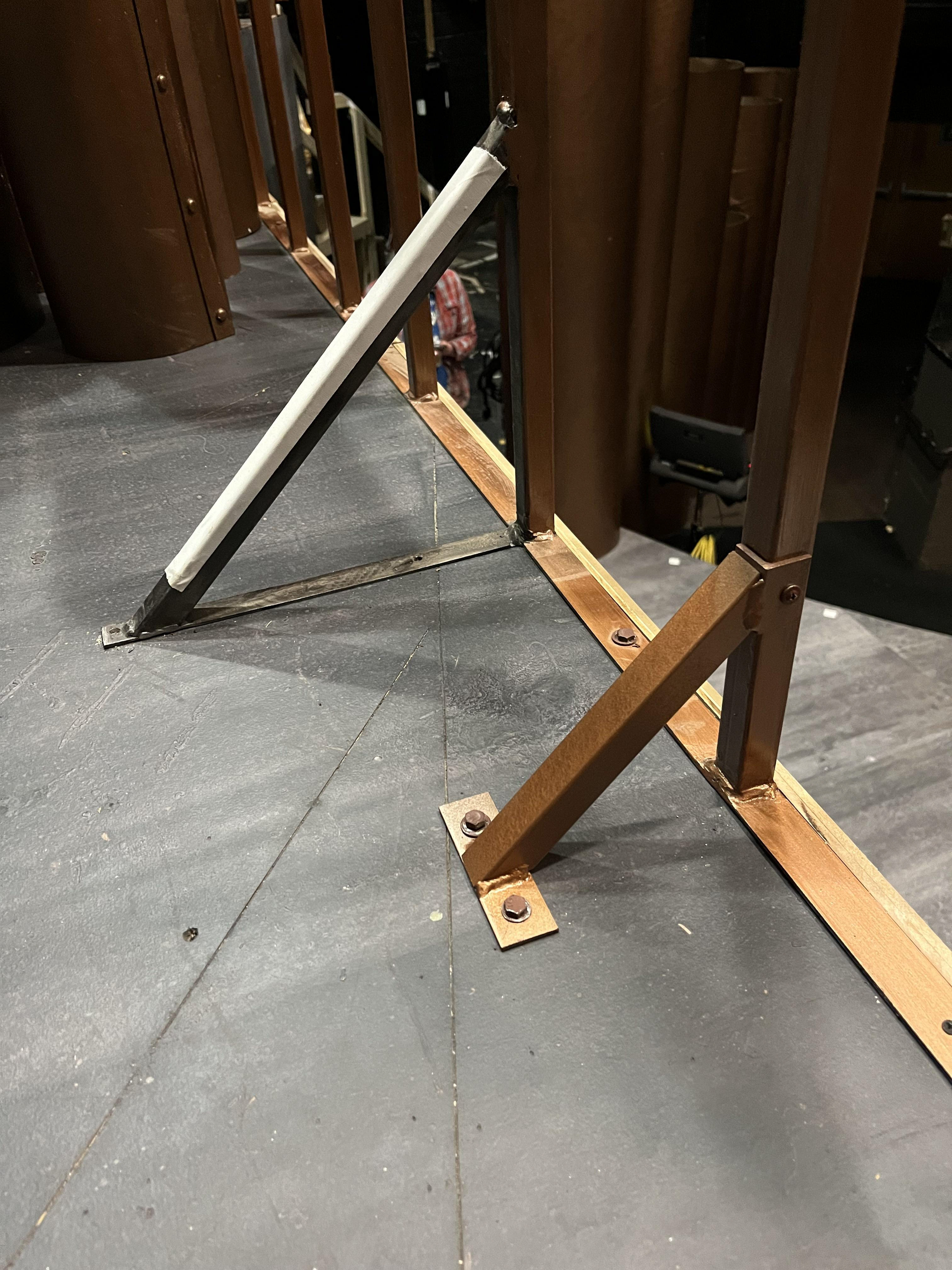 Made new, shorter supports for handrail when originals became a tripping hazard for actors.