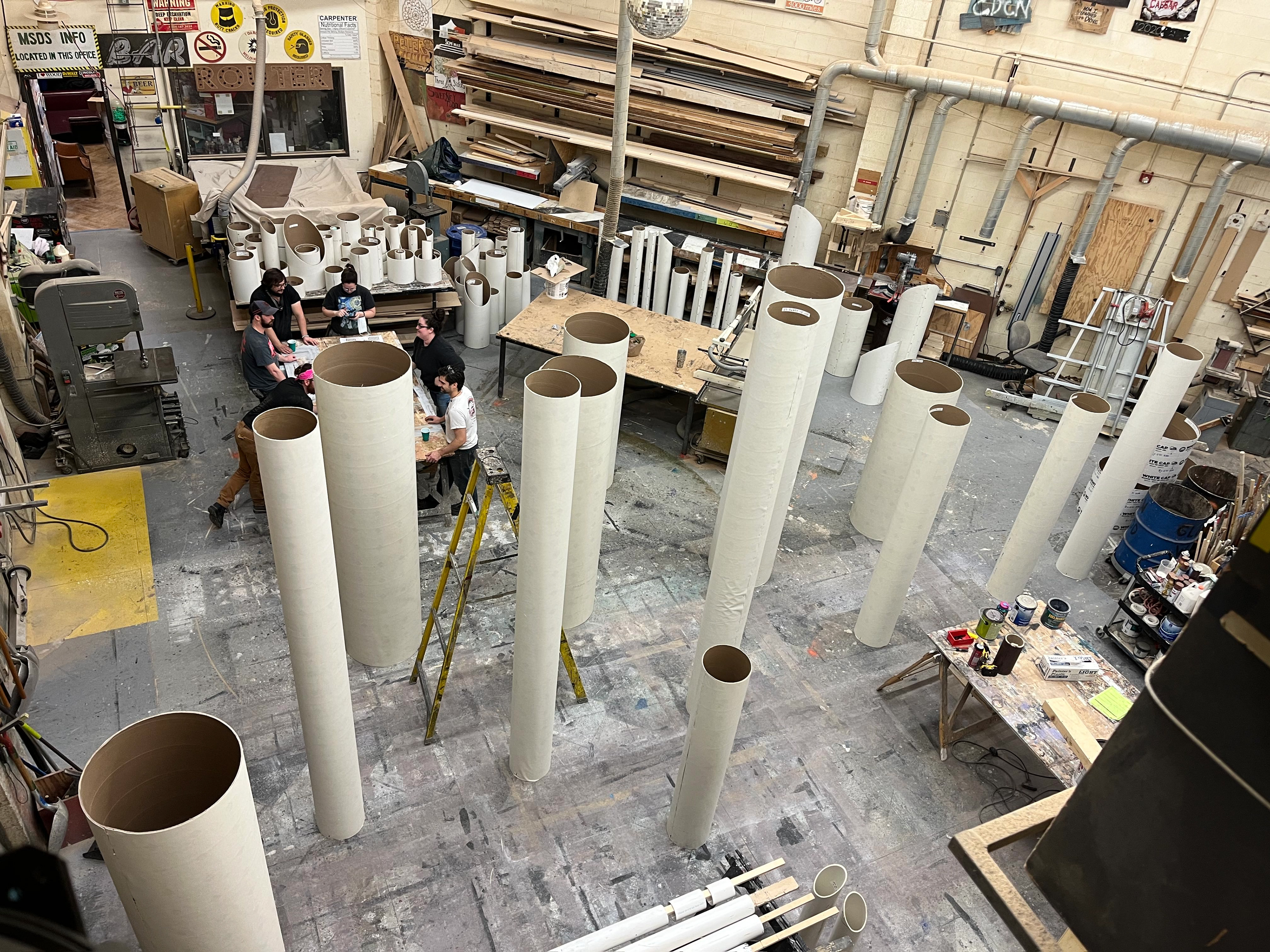 Sonotube was wrapped in vinyl to give paints a clean surface to bronze.