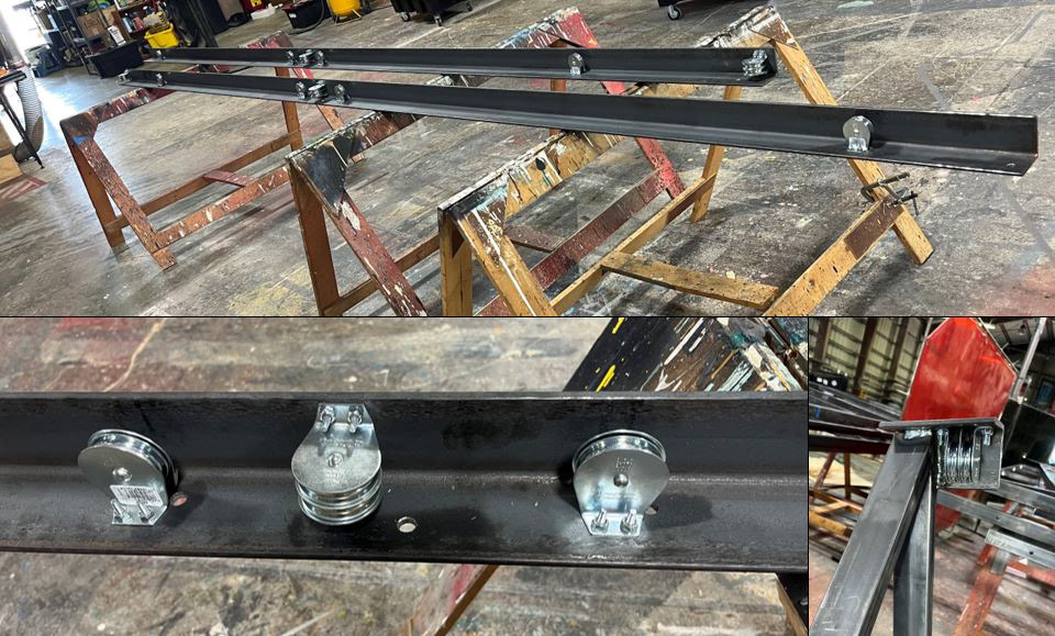 Manufactured garage door pulley system for four doors.