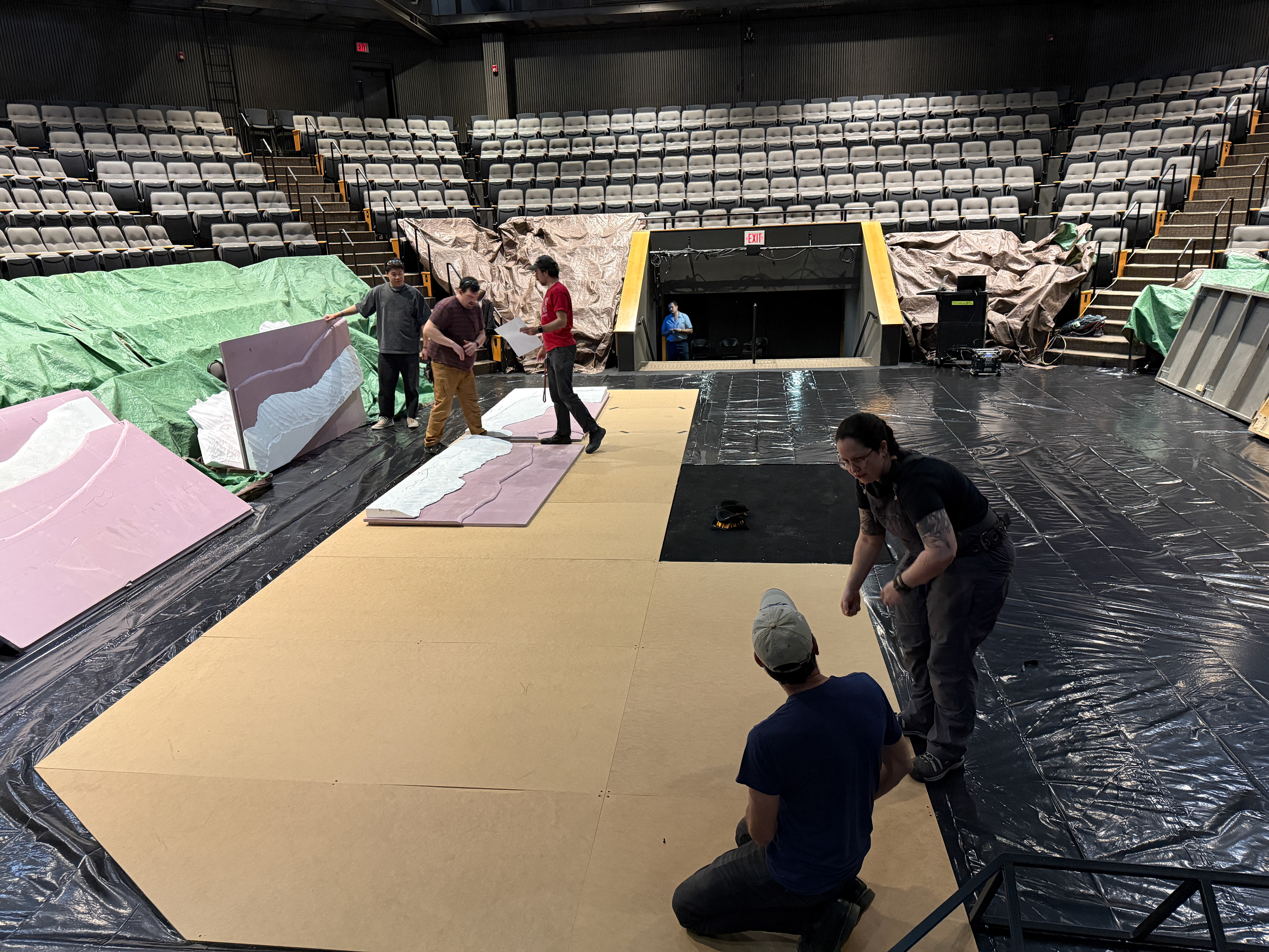Loading in the base of the pool (Visqueen --> MDF --> Foam buildups)