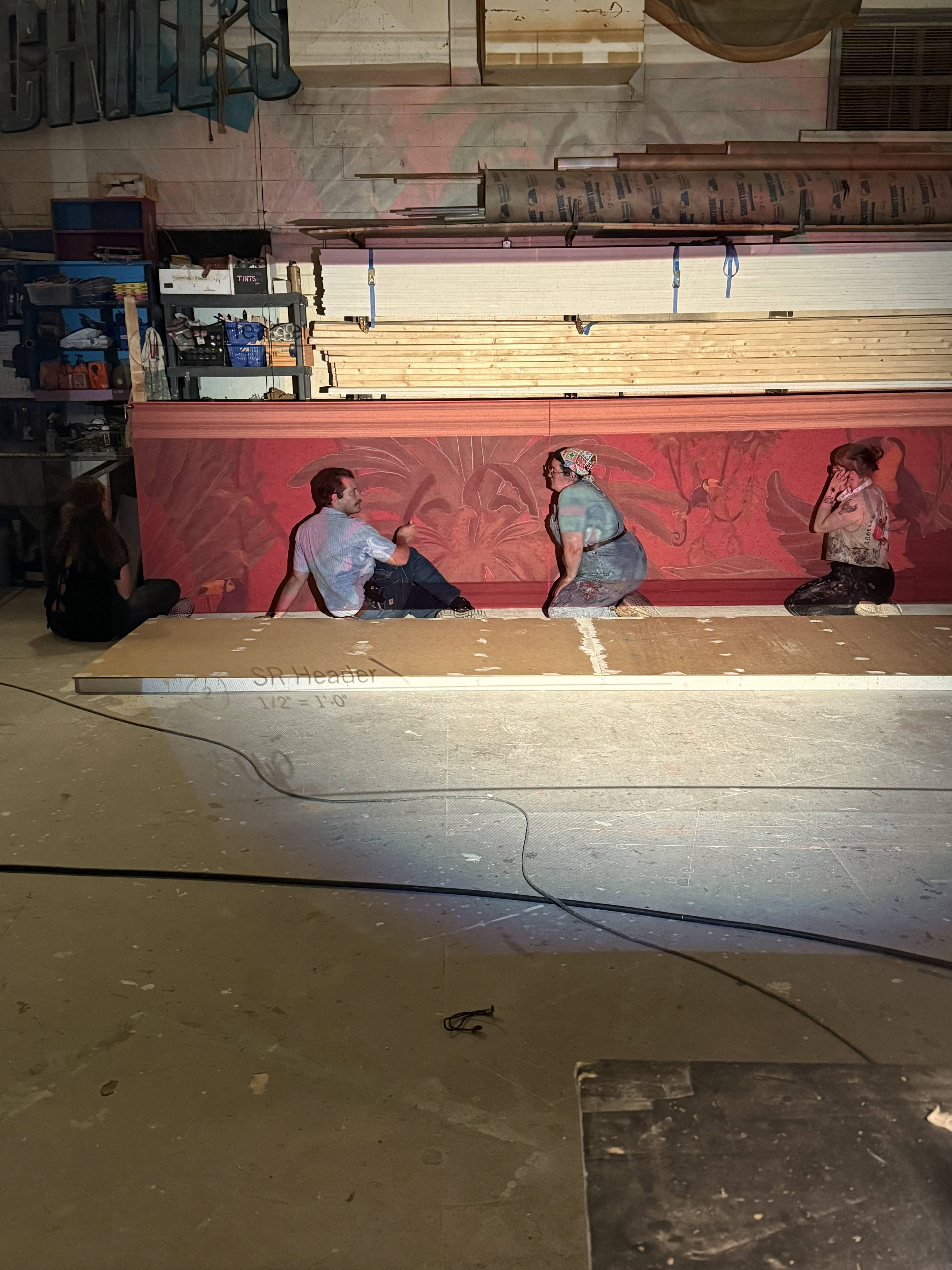 TD Ben conferencing with Scenic Charge Diane about False Proscenium Mural