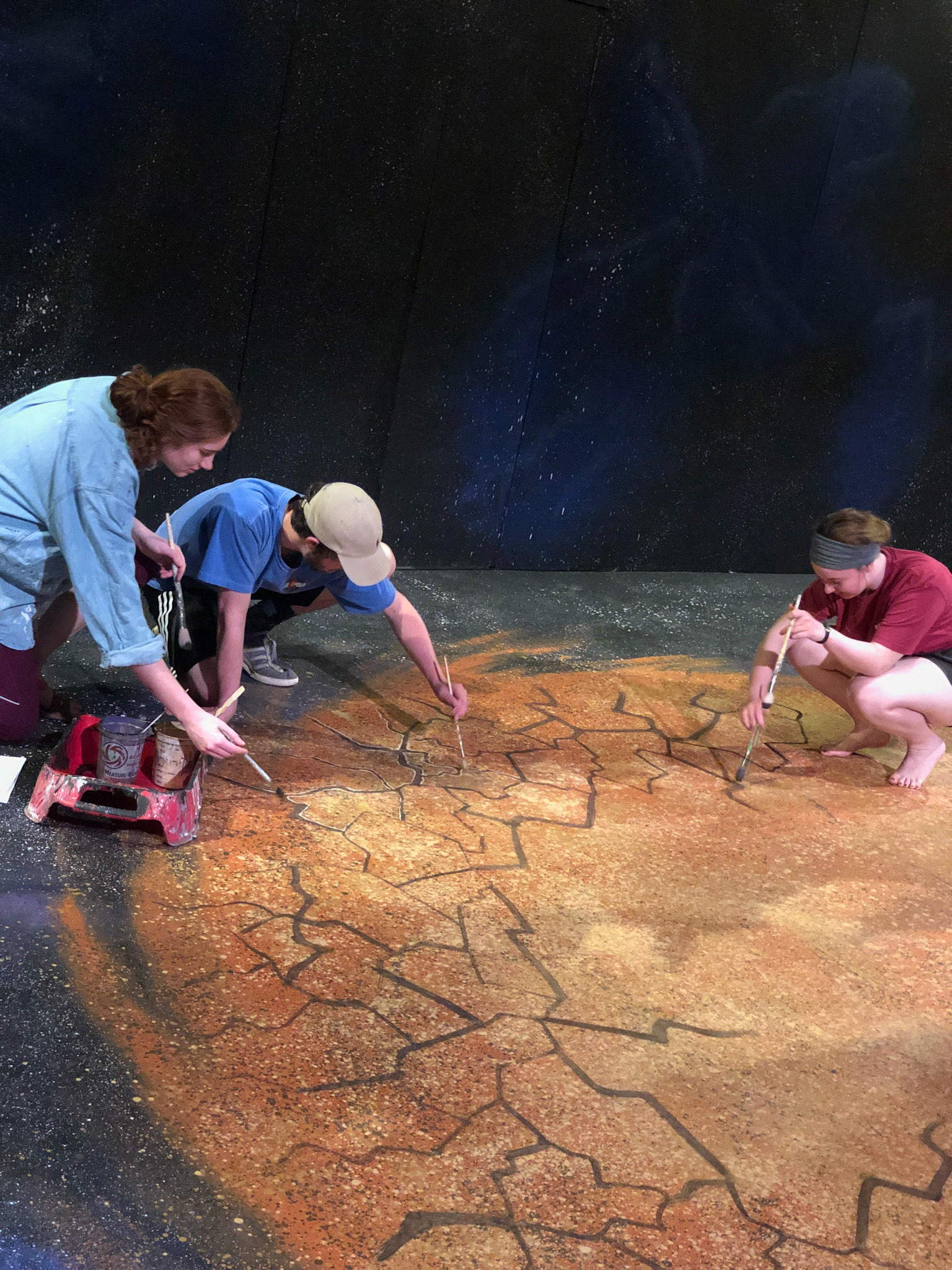 Worked with scenic charge on floor treatment.