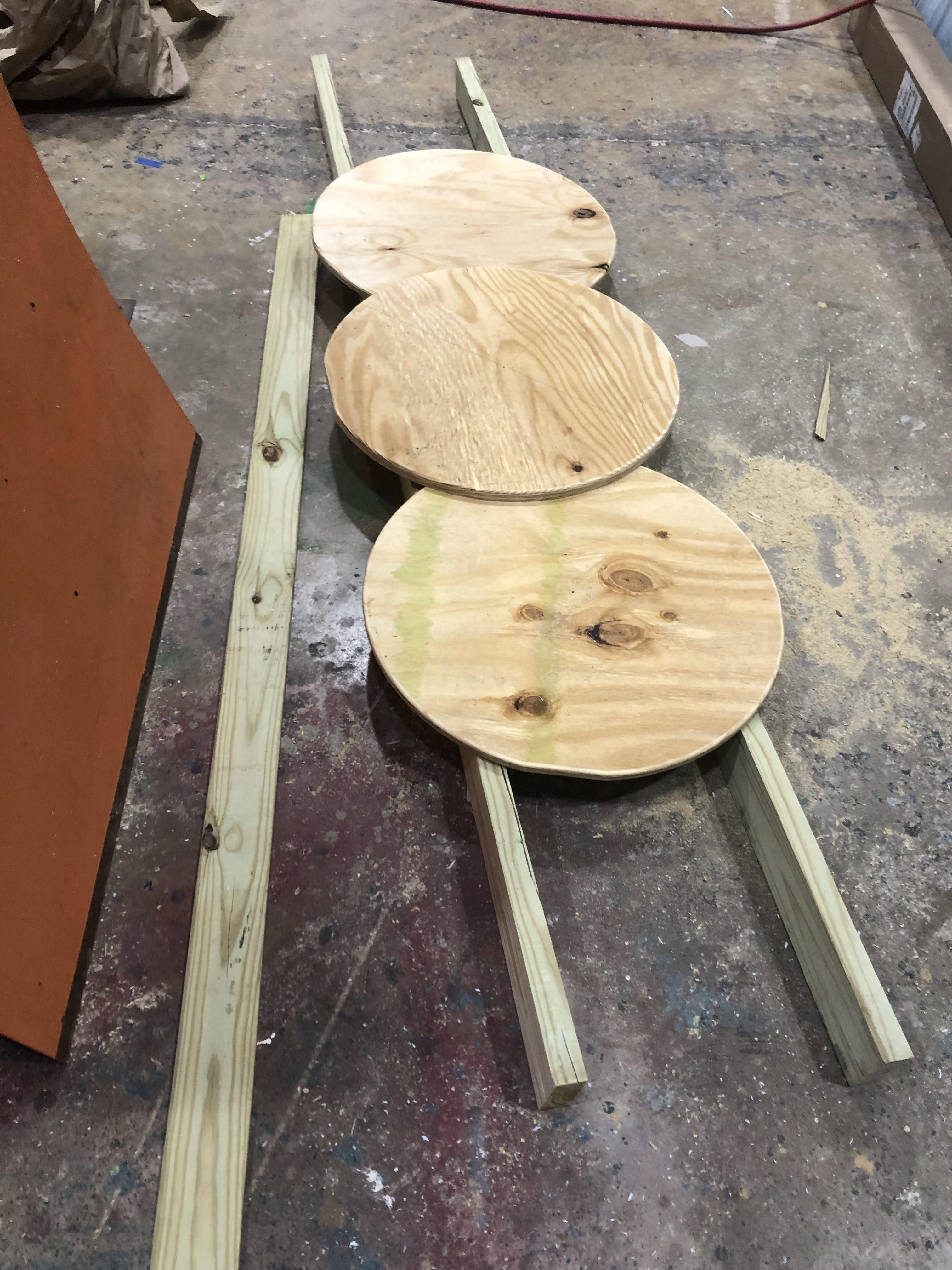 Cut plywood circles on tablesaw for "stretcher".