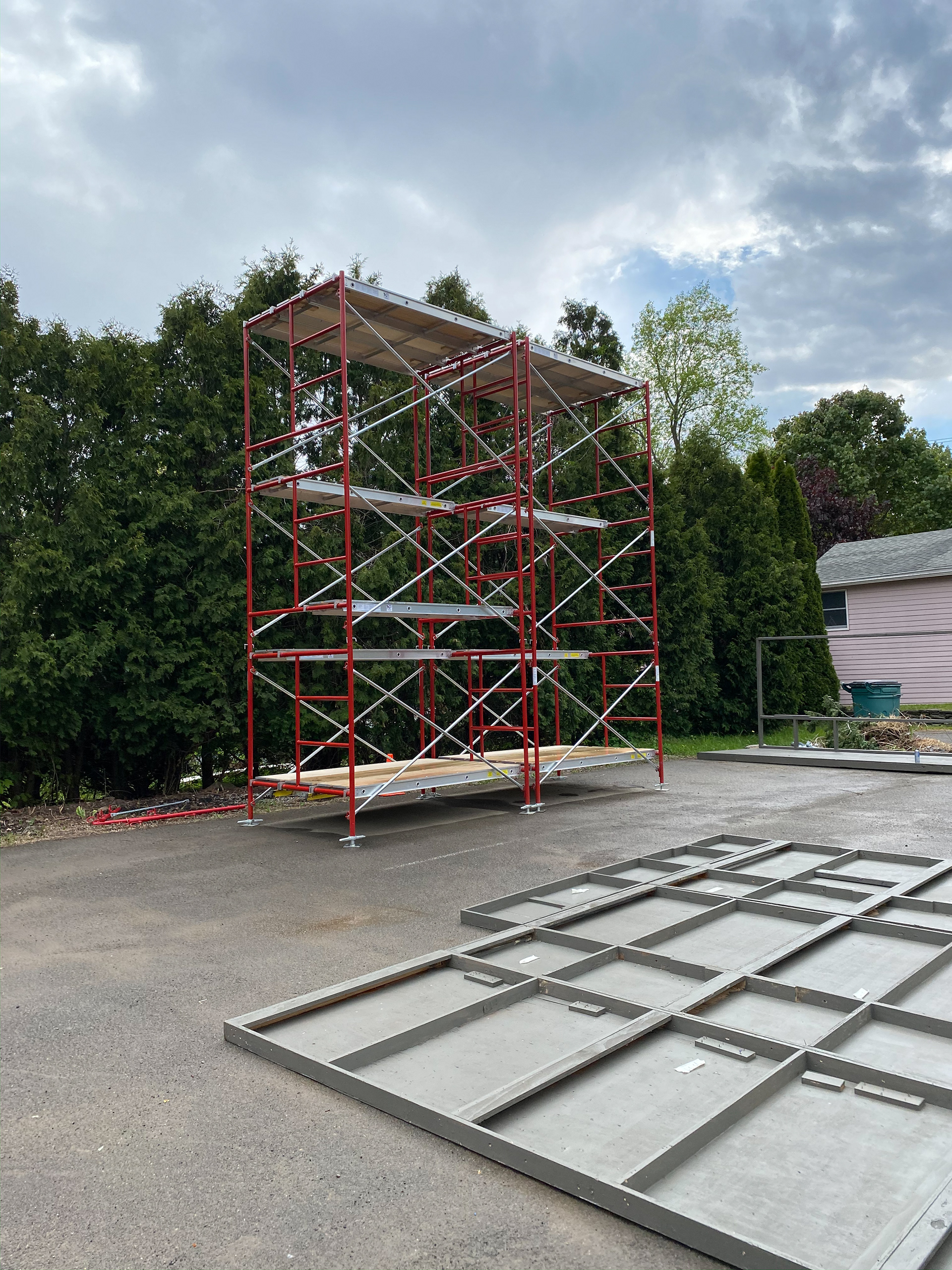 Installed scaffolding for bracing of the stage, which was also utilized as a tool during construction.