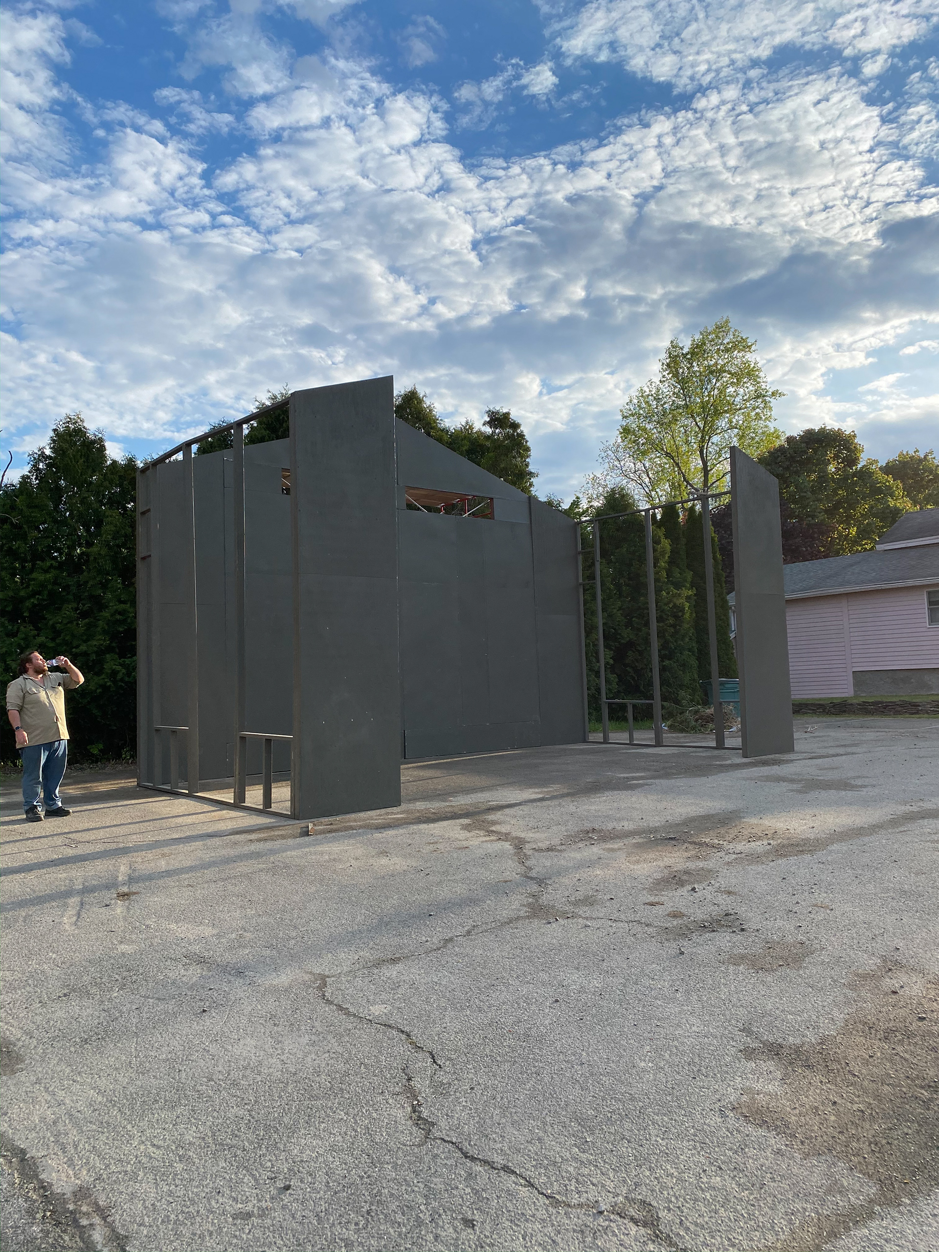 The back wall was walked up as one large unit, then attached to the scaffolding.