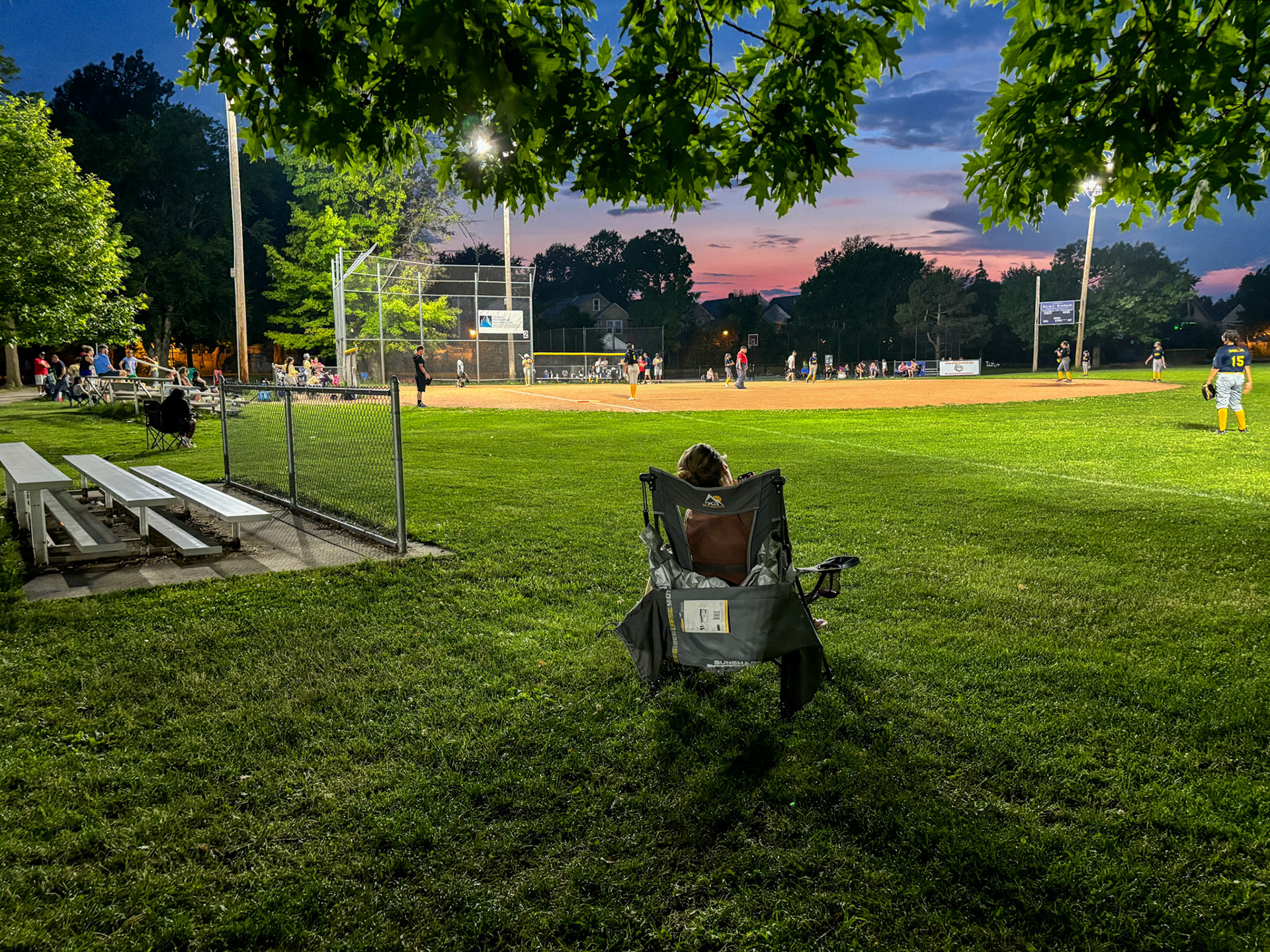 Watching a baseball game at Shoshone Park in North Buffalo