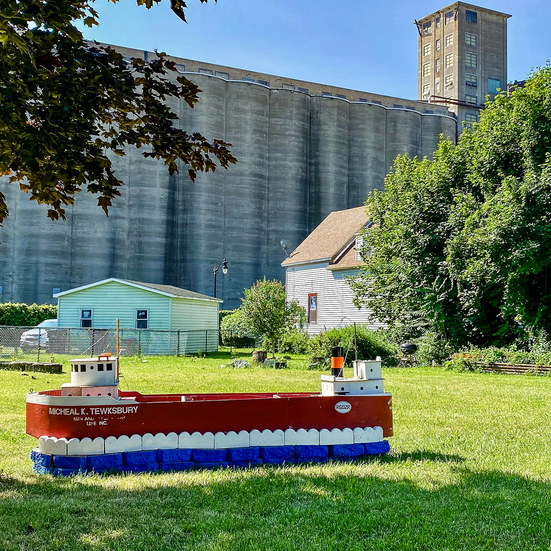 Old First Ward Backyard with model of the Tewskbury Lake Freighter, Buffalo NY