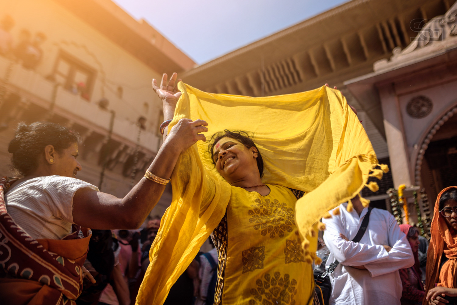 Breaking the shackles of tradition, around 800 widows played Holi with gulaal and flowers in the land of lord Krishna, Vrindavan in four-day Holi celebrations that began on February 24th.. Woman dancing on the tunes of Radhe Radhe during Holi celebrations in Vrindavan, Uttar Pradesh, India Widow Holi