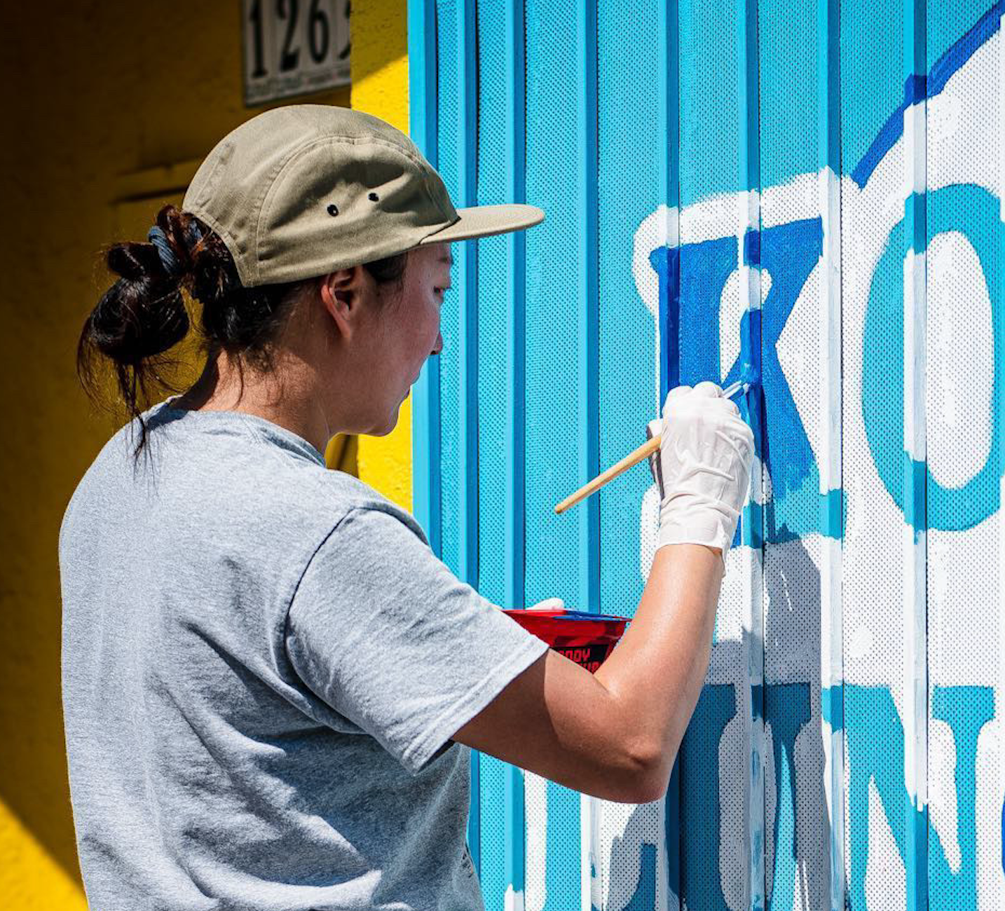 artist painting a mural