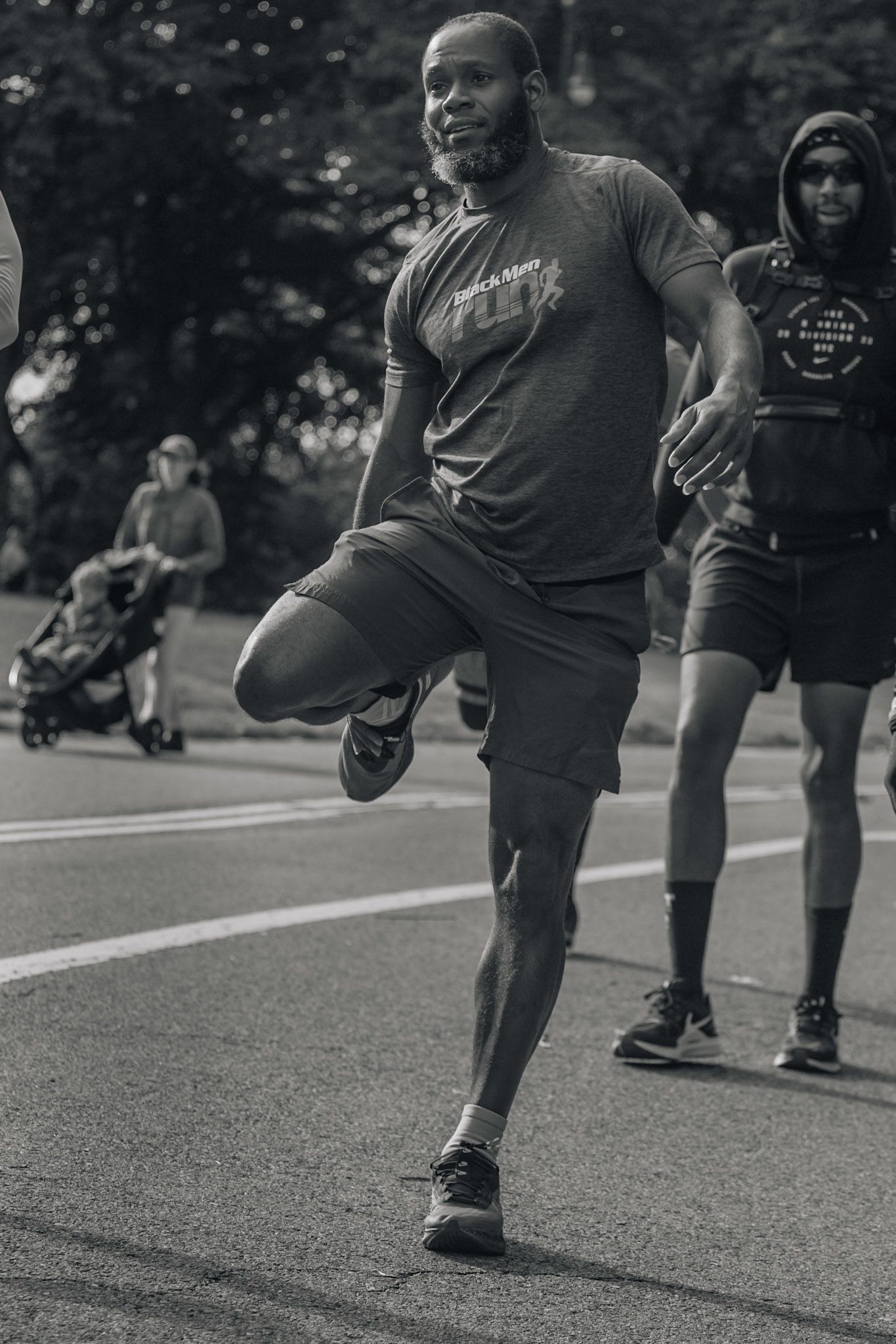 Black Men Run NYC club member,Richard Scott, stretches to warm up for the club's 3 mile run in Prospect Park in Brooklyn, Sunday, Oct. 15, 2023, Photo Tabius McCoy