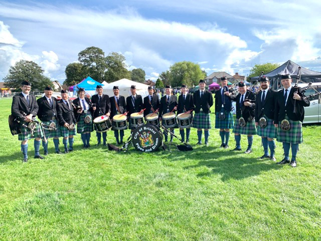Image of Stuart, of Pipers Call, with his fellow bandsmen and women, of the City of Bristol Pipes and Drums