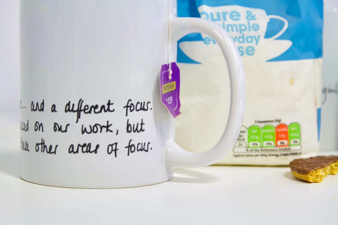 Close up photo of a mug showing partial quote