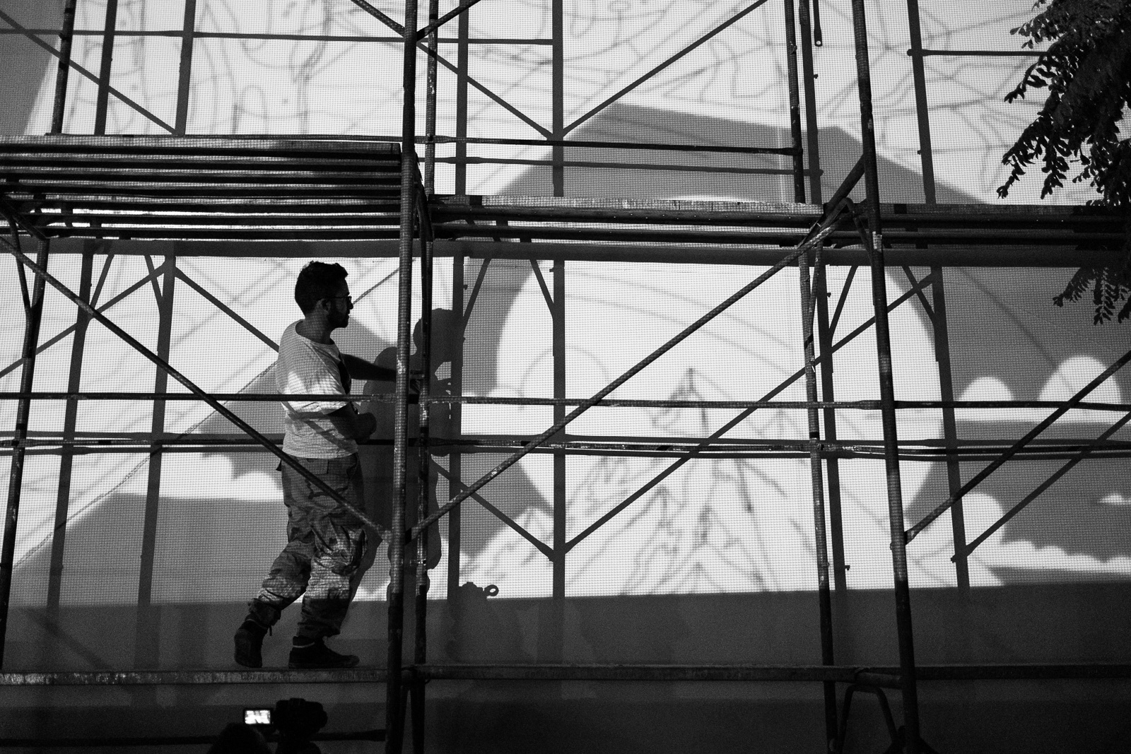 The winner of the 2014 Award, Vidam, working on his mural. PhotoCredit: Igor Motl
