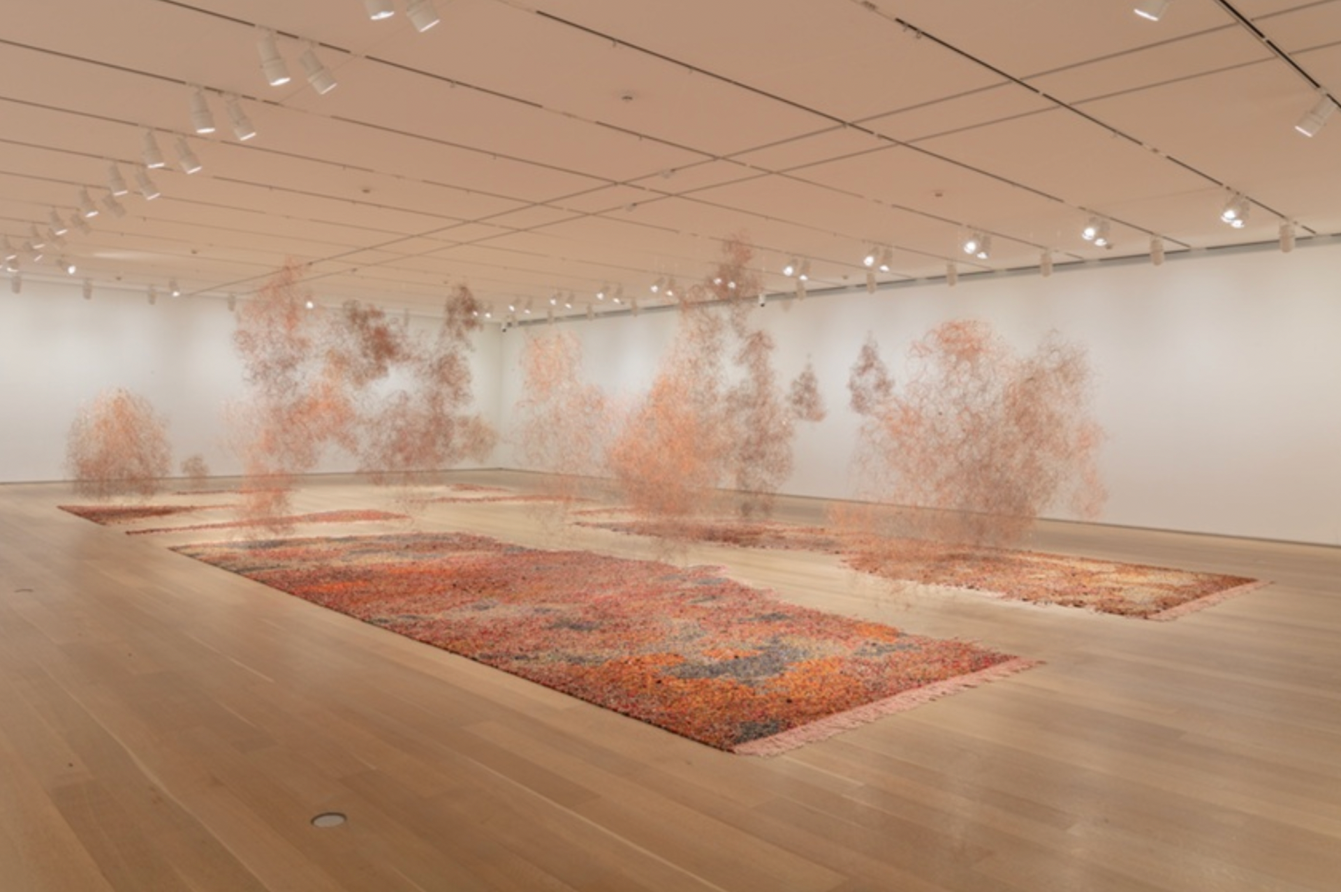 Igshaan Adams, Epping II, 2021, wood, painted wood, plastic, glass, stone beads, seashells, chain, polyester and nylon rope, cotton fabric, wire, cotton twine, and fabric dye, 1500 × 700 × 300 cm (590 5/8 × 275 5/8 × 118 1/8 in).