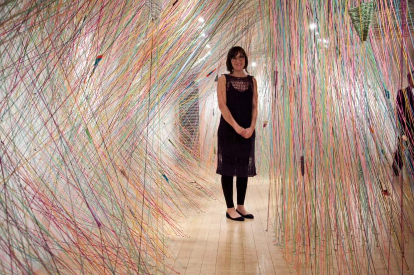 Tanya Aguiñiga, Crossing the Line: A Space, 2011, site-specific installation using backstrap weaving techniques and mixed textile materials, dimensions variable.