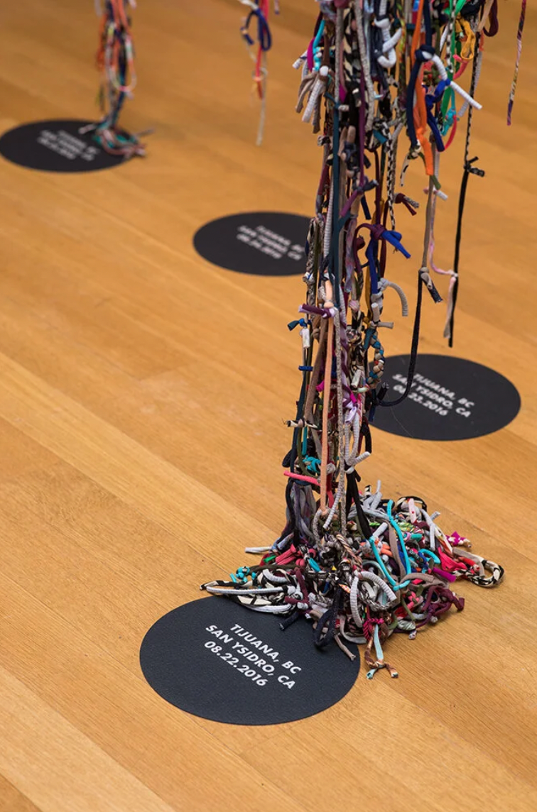 Tanya Aguiñiga, Border Quipu/Quipu Fronterizo, 2016–2018, mixed media sculpture composed of knotted fabric strands collected from border crossing participants, dimensions variable (Los Angeles County Museum of Art collection).
