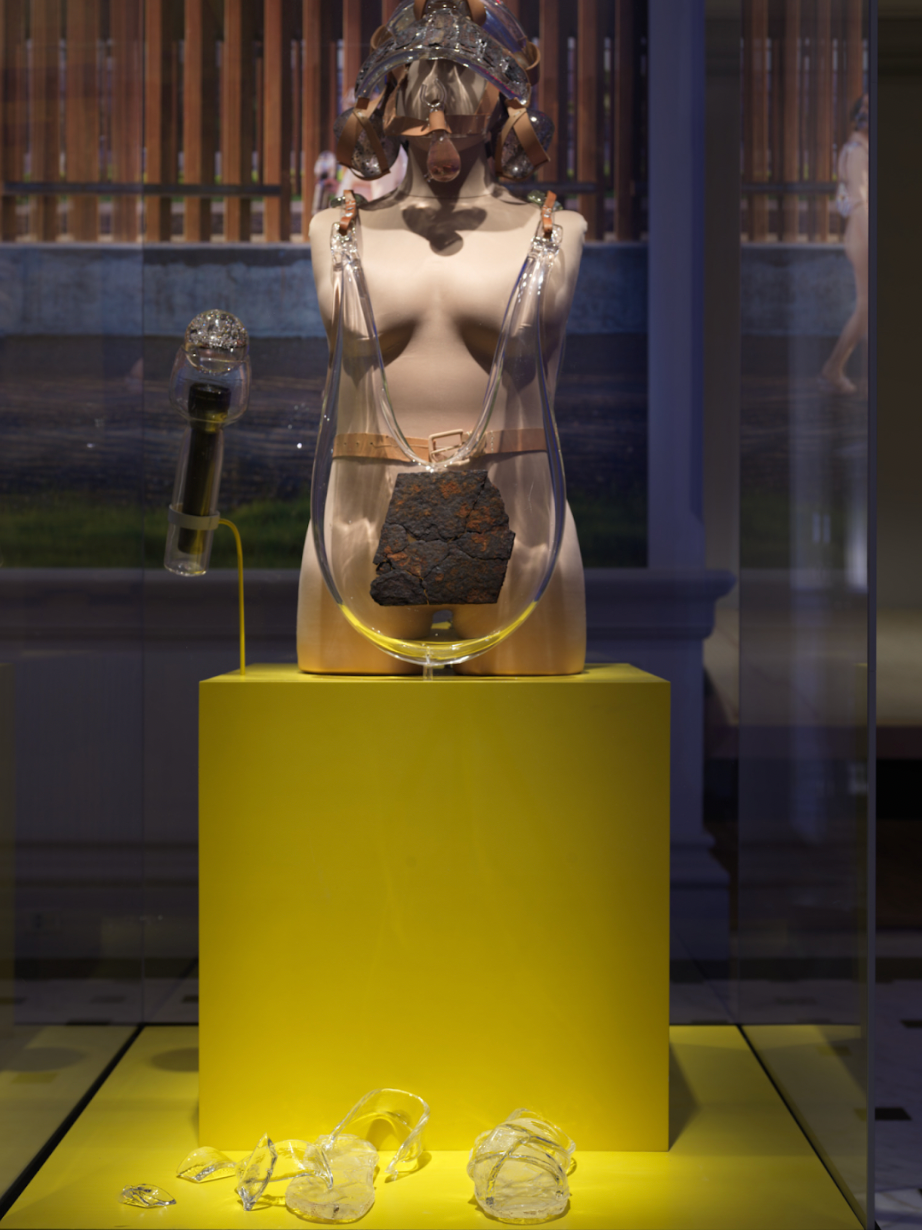 Tanya Aguiñiga, Metabolizing the Border, 2018–2020, performance with wearable objects (glass, neoprene, rusted metal fragments of U.S.–Mexico border fence, leather, cotton twine, flashlight) and digital photodocumentation, dimensions variable.