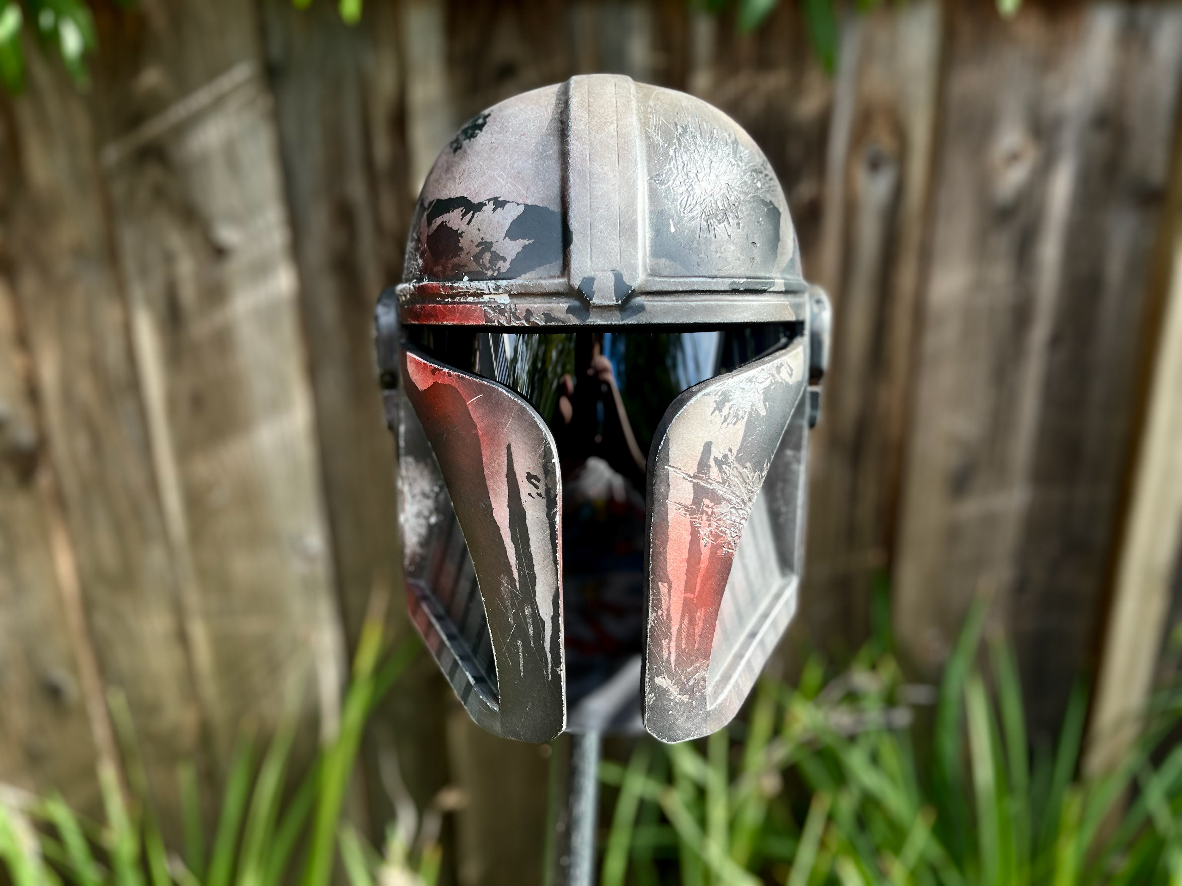 Resin cast Mandalorian helmet with skull. May 2024.