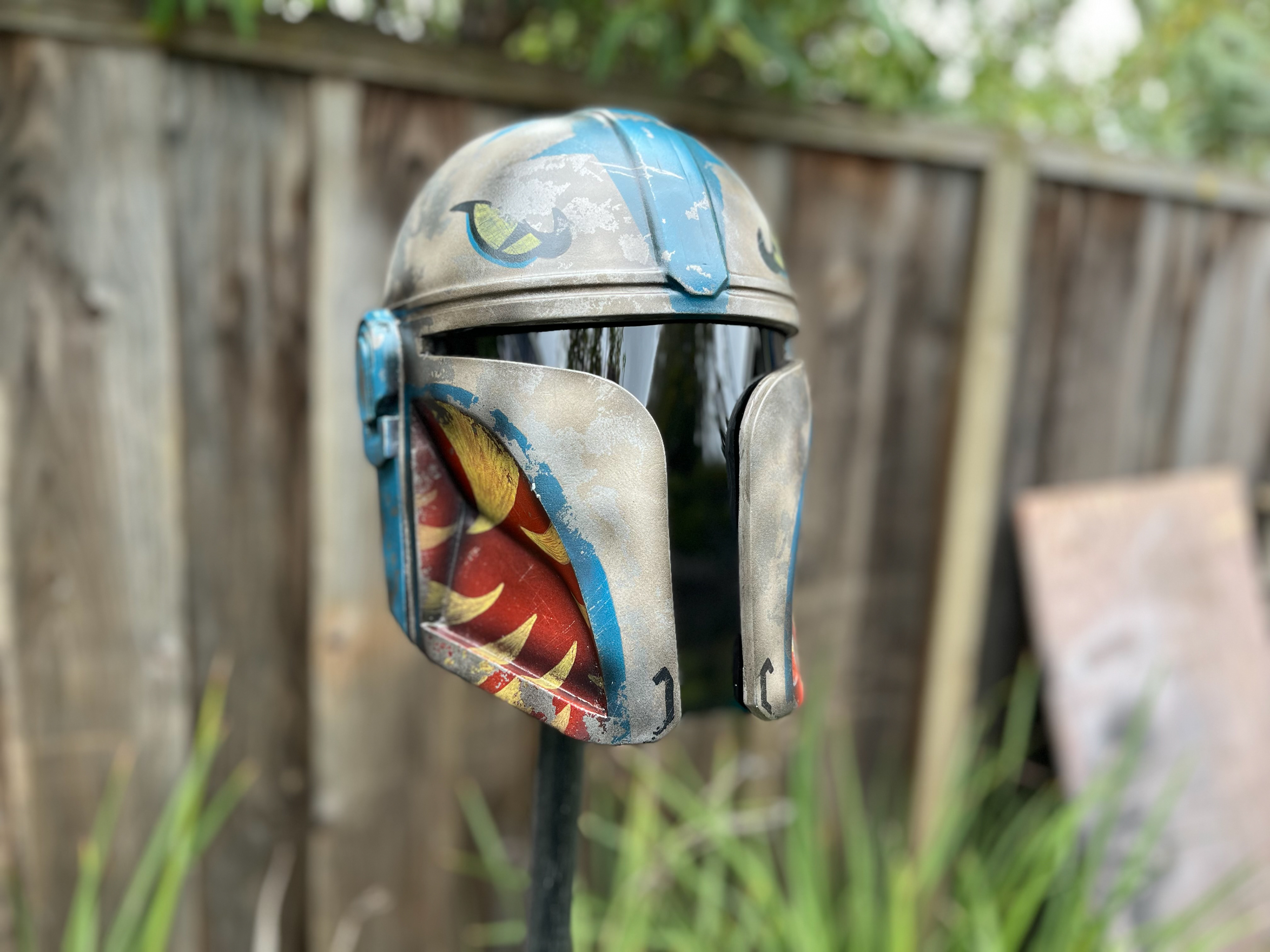 Resin cast Mandalorian Paragon helmet. Finished with airbrush and Posca paint pens. Mar 2024.