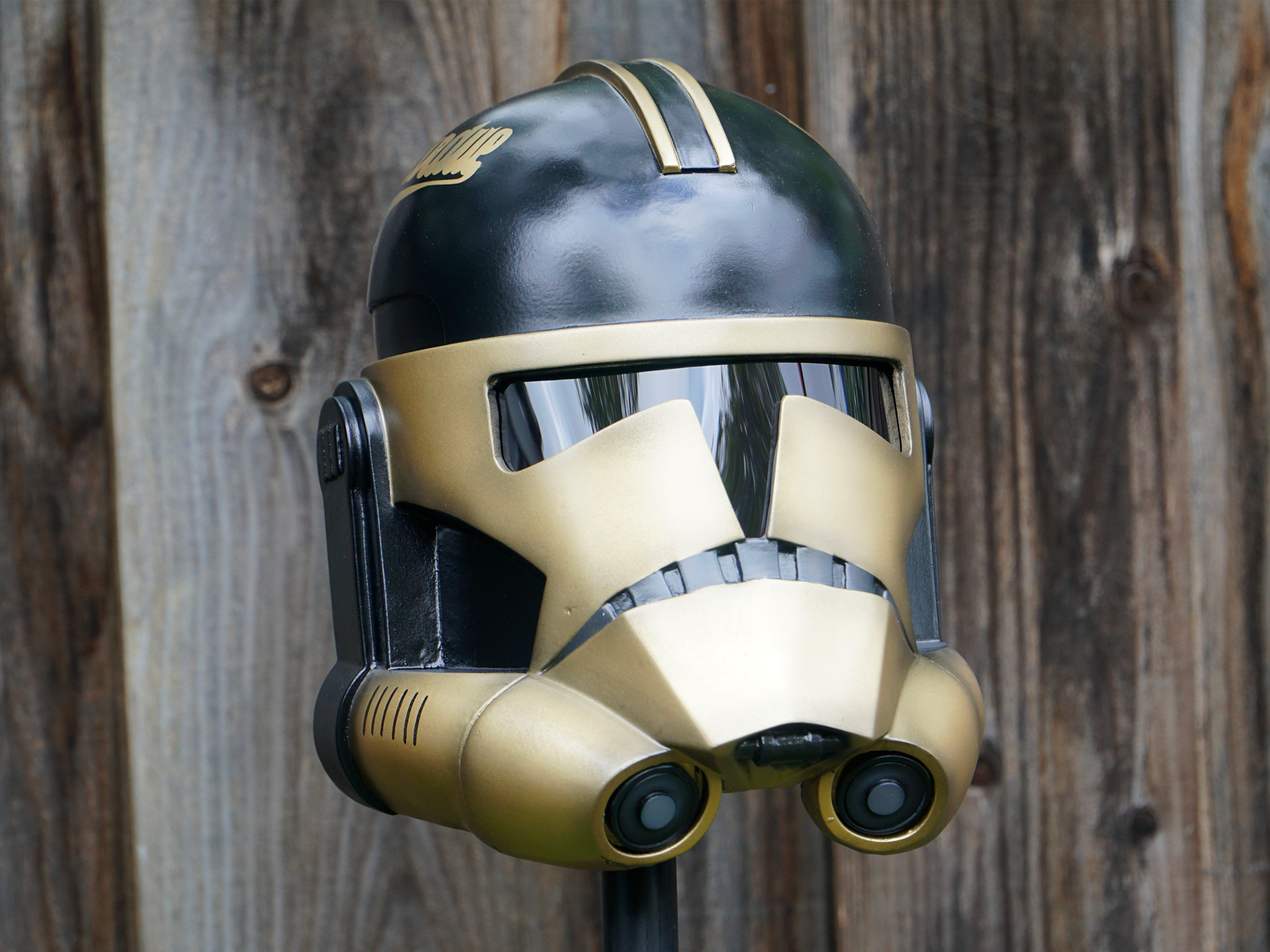 Resin cast black and gold Clone Trooper. Feb 2025.