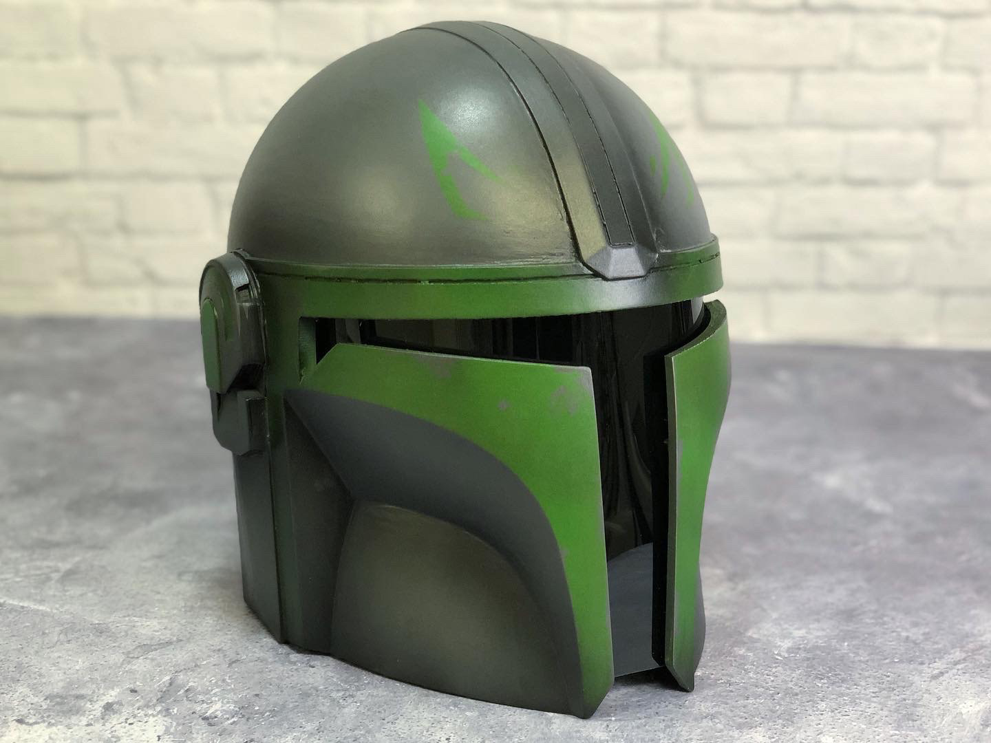 3D Printed Mandalorian helmet (Green jail eyes). Digital files from Thingiverse. Mar 2021.