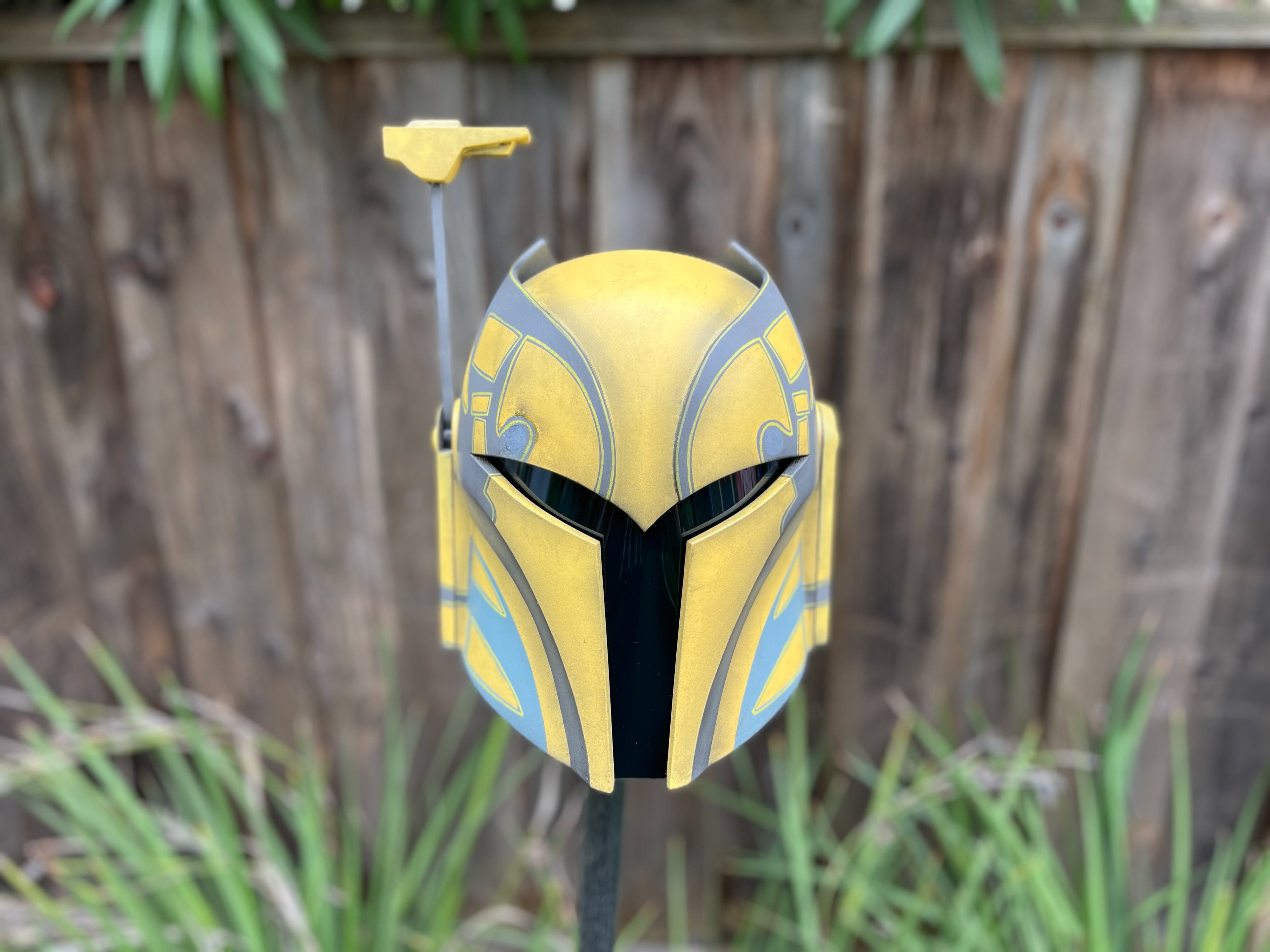 3D printed Ursa Wren helmet. Digital files from Cults3D. Design taped by hand. Finished with spray paint, acrylic wash, and airbrush. Apr 2024.