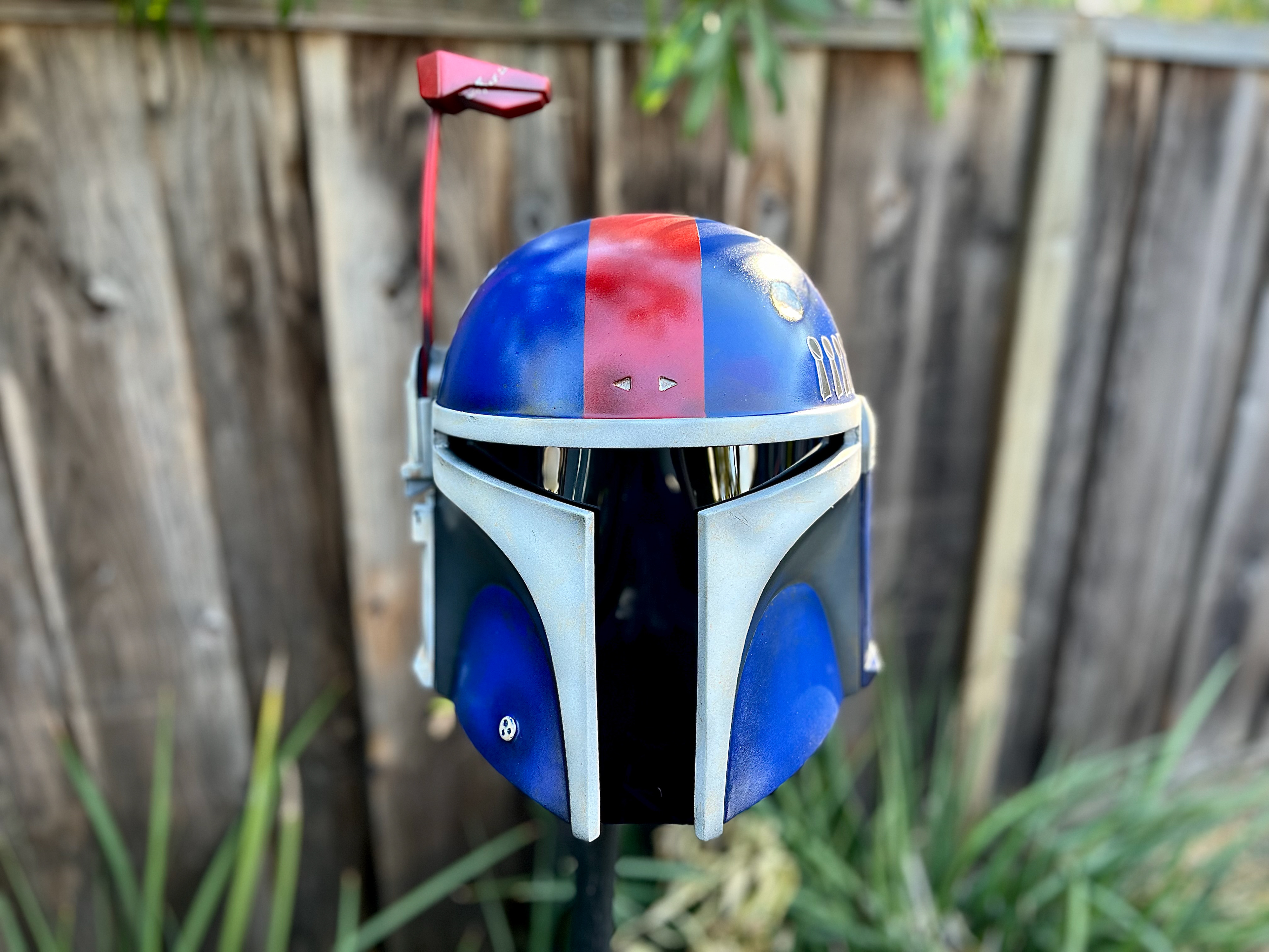 3D printed blue and red Mandalorian helmet. Files from Galactic Armory. Sept 2024.