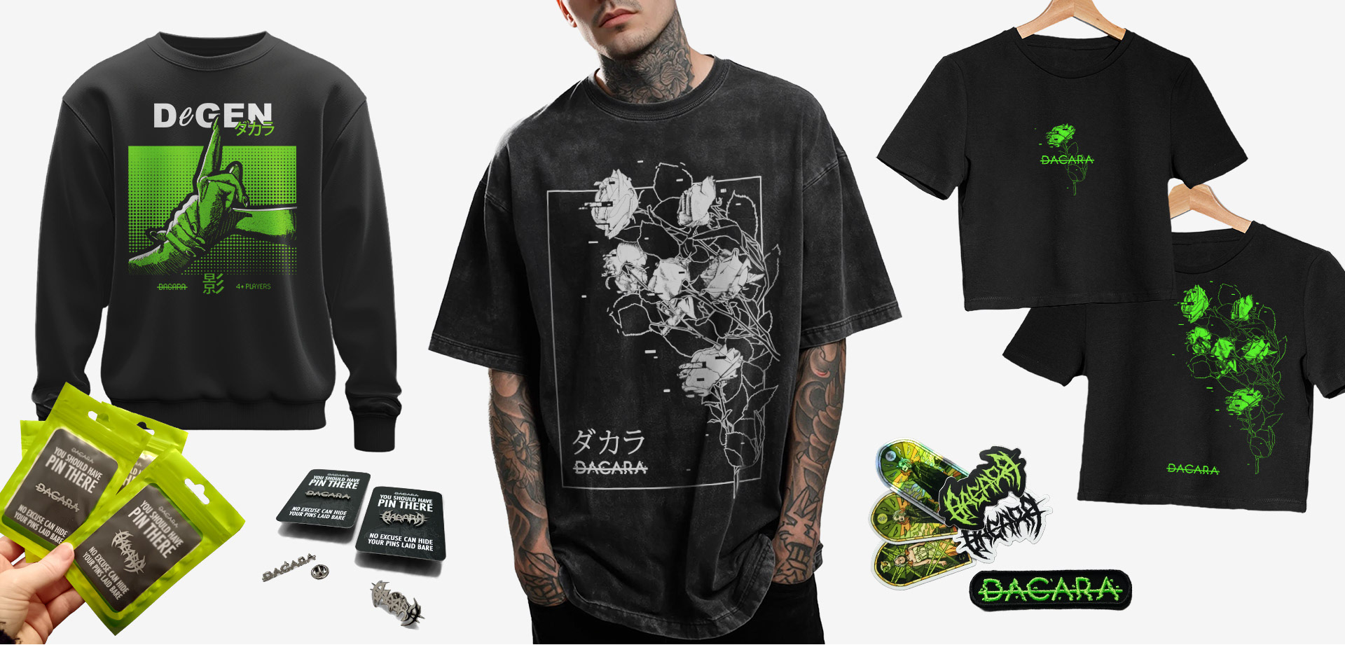 DACARA merch including acid wash tees, pin badges and crop tops