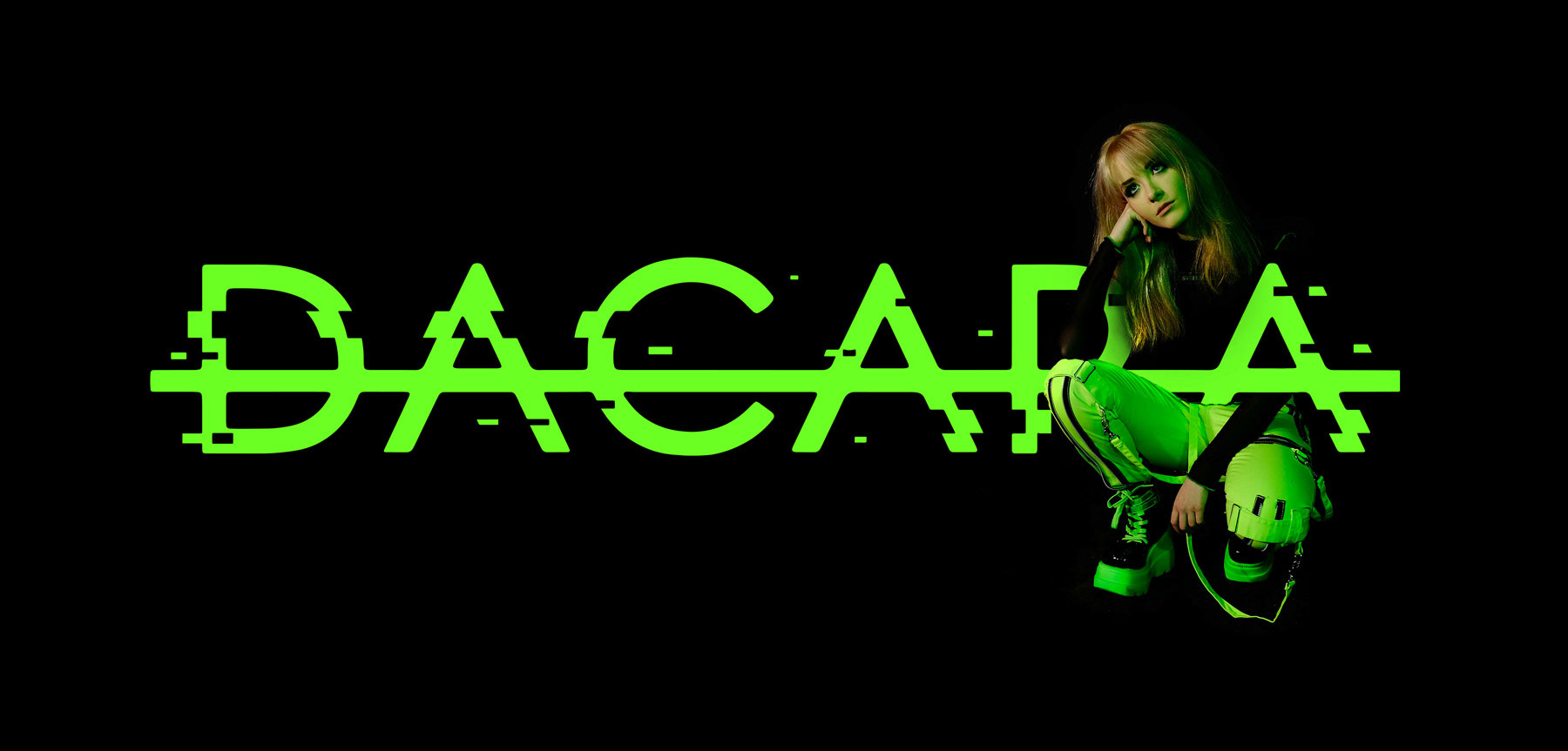 Vibrant green DACARA logo with vocalist Emma Shippen