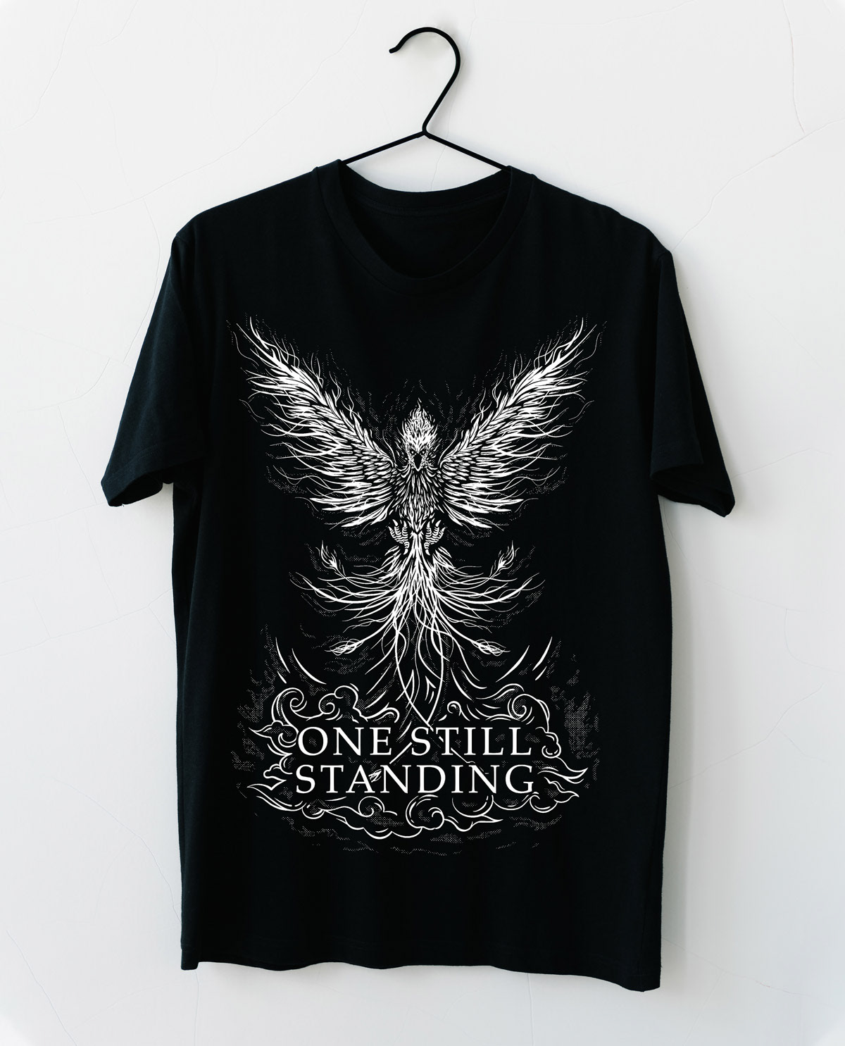 White tshirt design on black shirt featuring a phoenix rising upwards