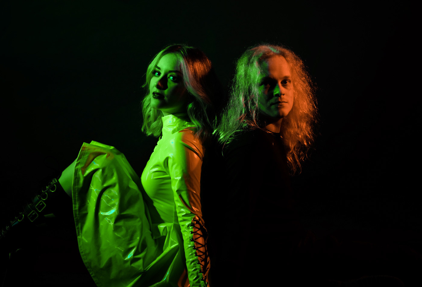 Vocalist Emma Shippen and guitarist David Dyson sat back to back