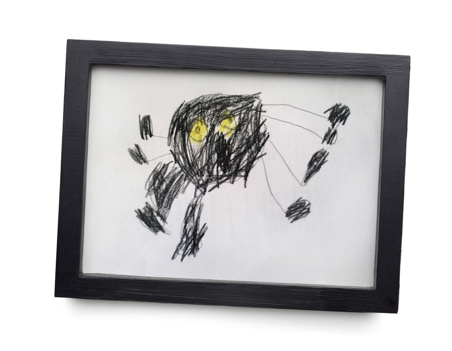 Childhood drawing of a spider in photo frame