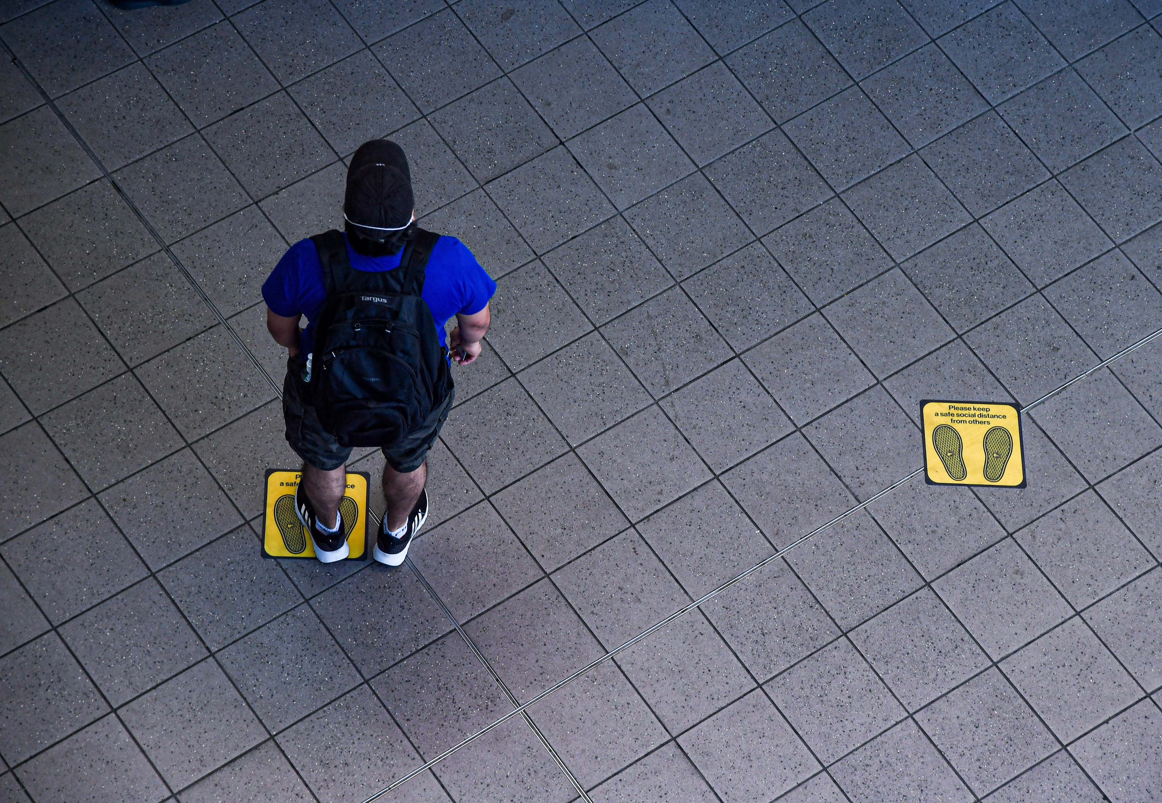 Social Distancing decal installation. Photo credit: Marc Hermann
