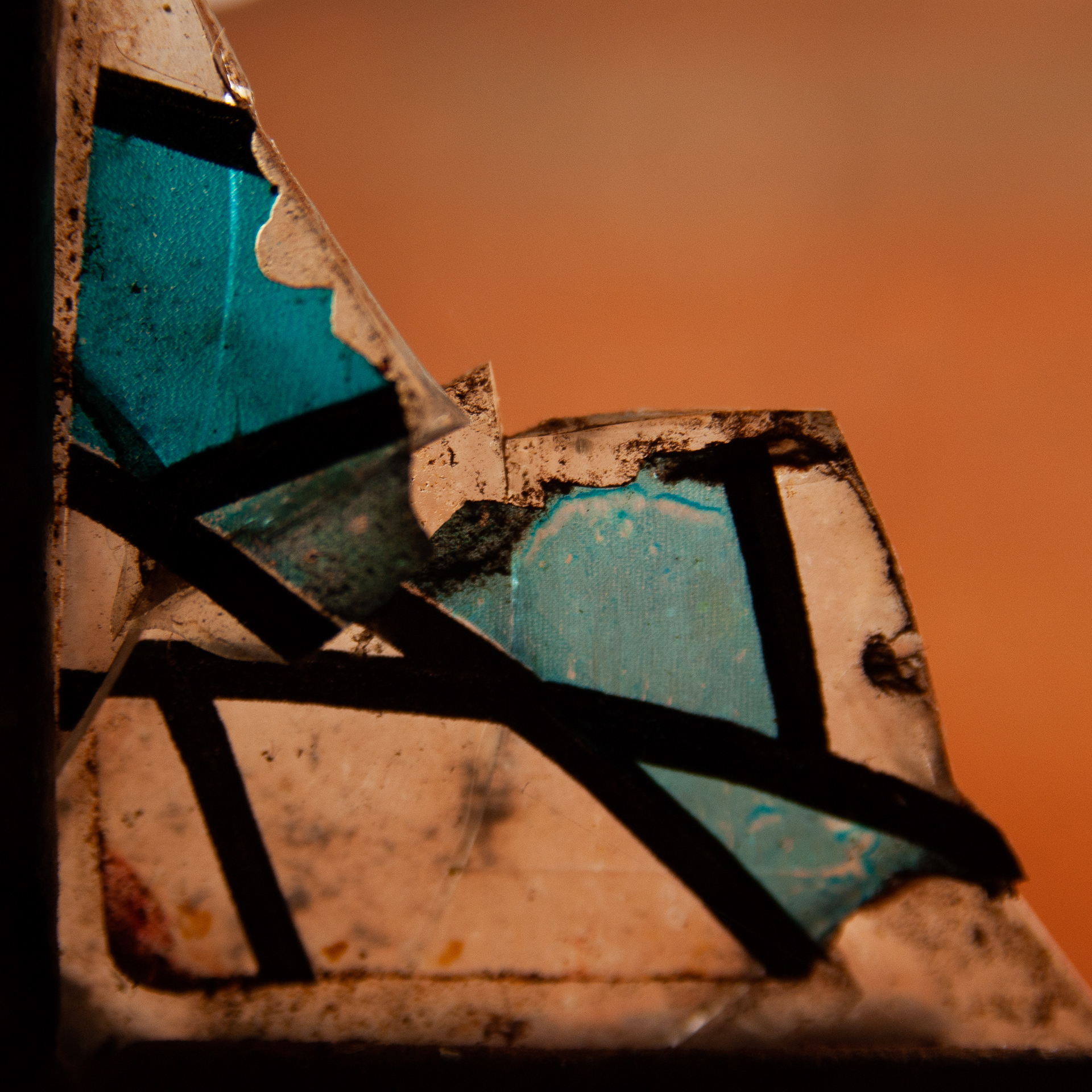 A smashed stain glass window in Ntarama Church, Rwanda