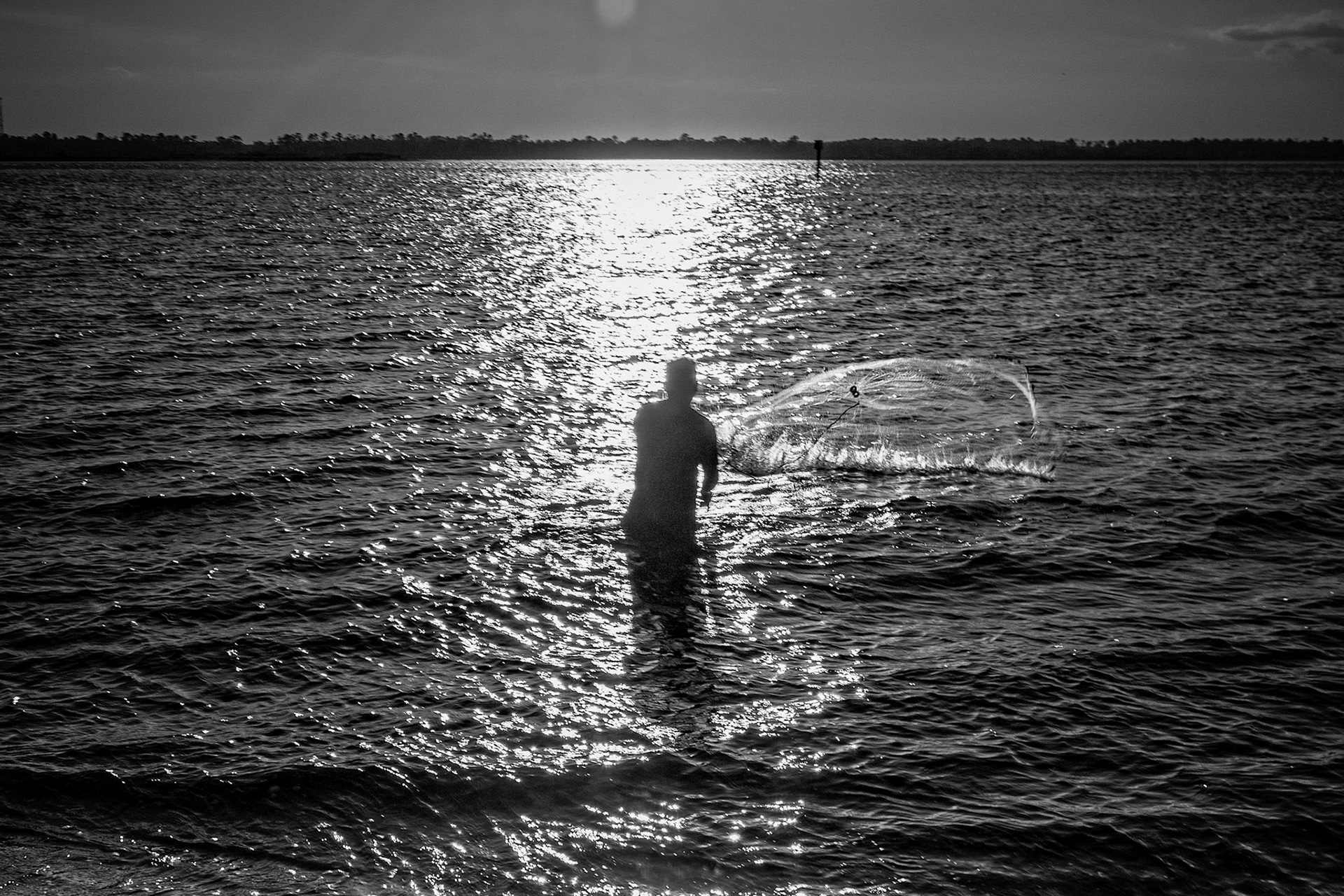 Net Casting at Sunset