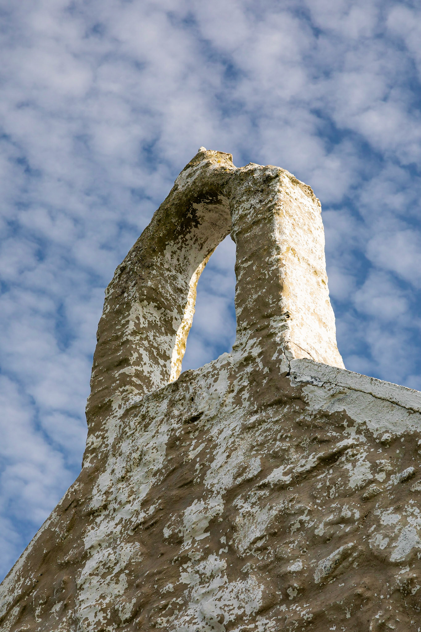 The bell-cot on the Church of St. Cwyfan, Porth Cwyfan, Anglesey.