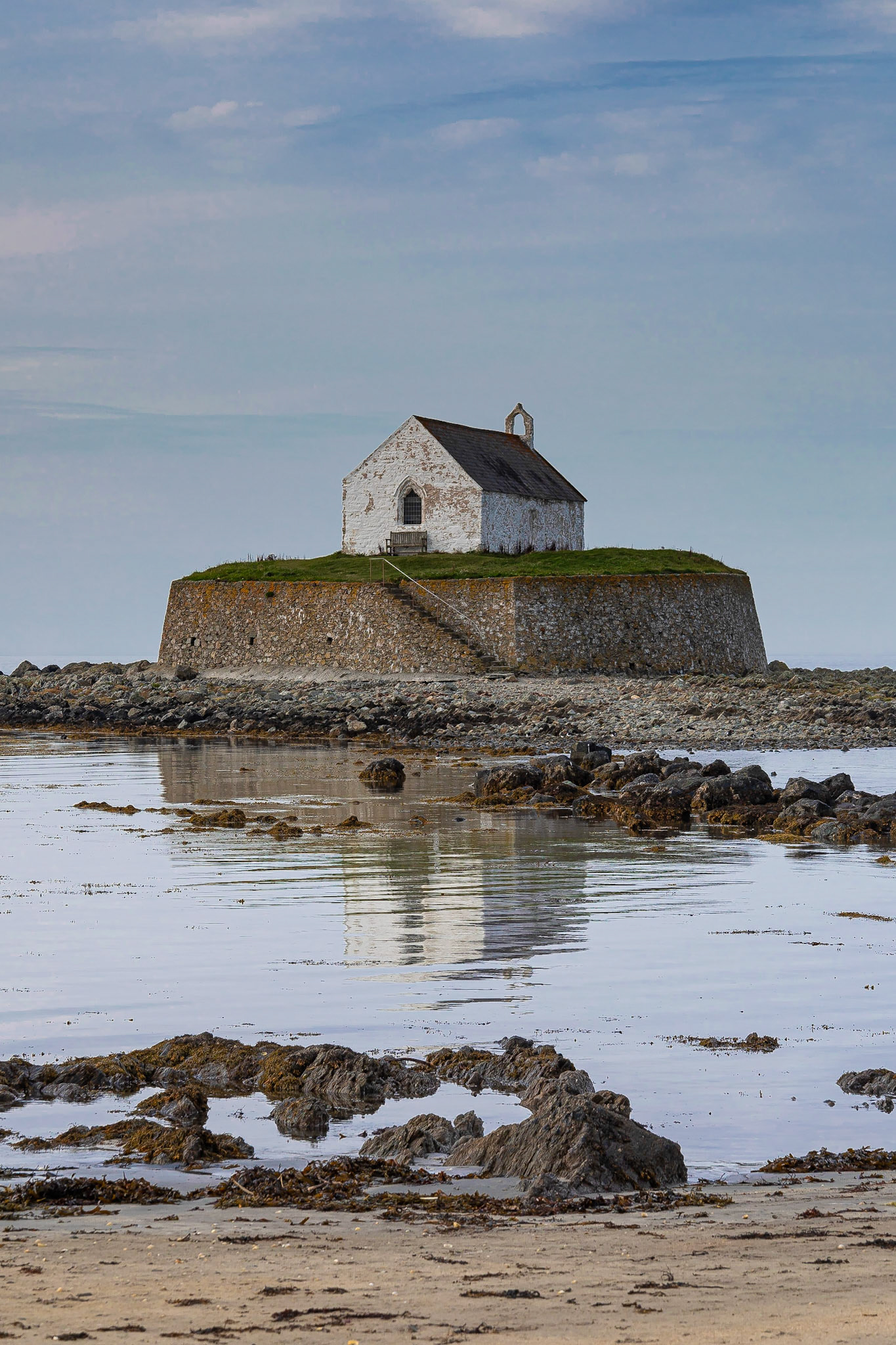 Church of St. Cwyfan at low tide, Porth Cwyfan, Anglesey, Wales.