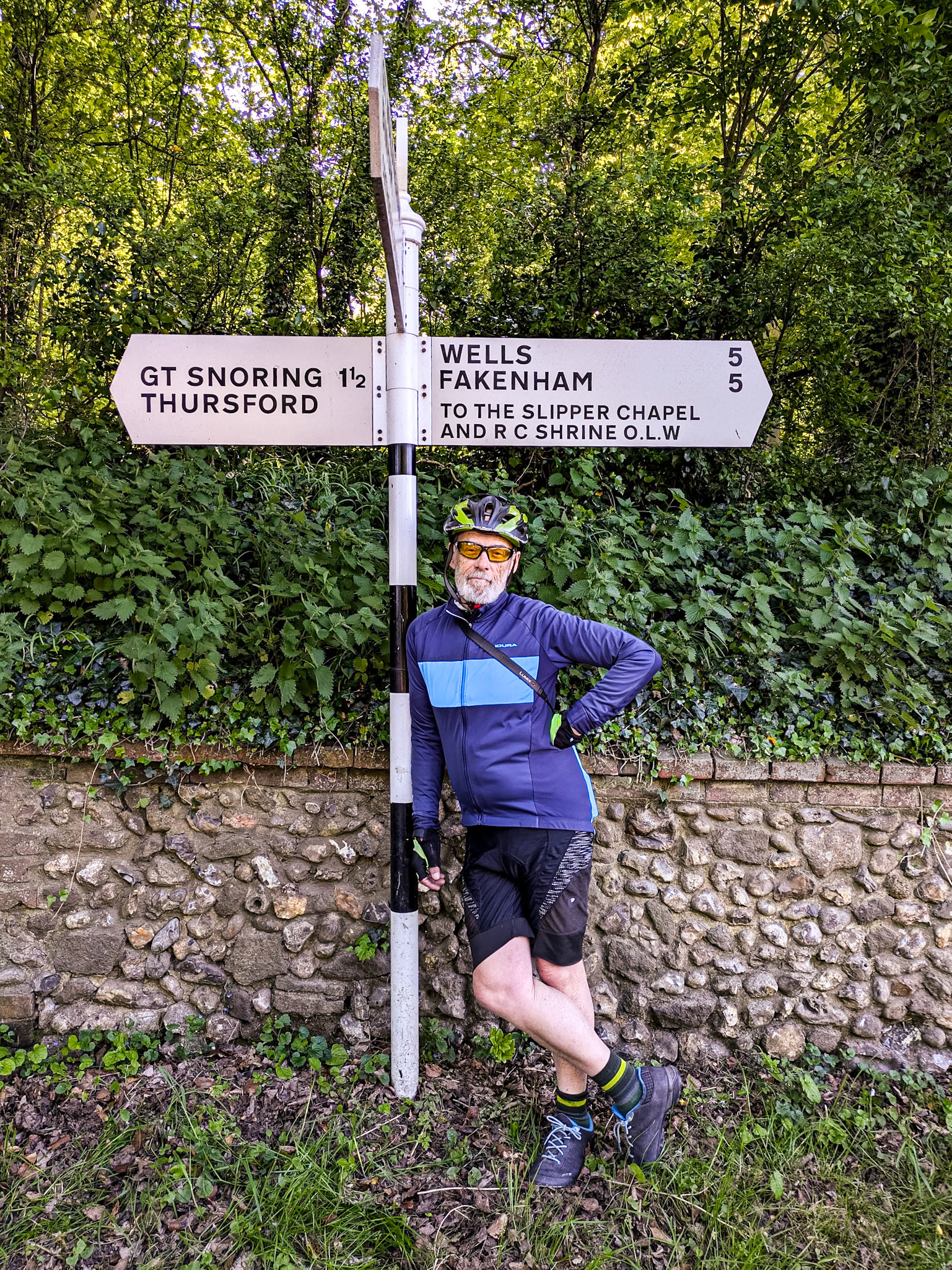 Signpost with "Great Snoring", Little Walsingham, England, 9 May 2025