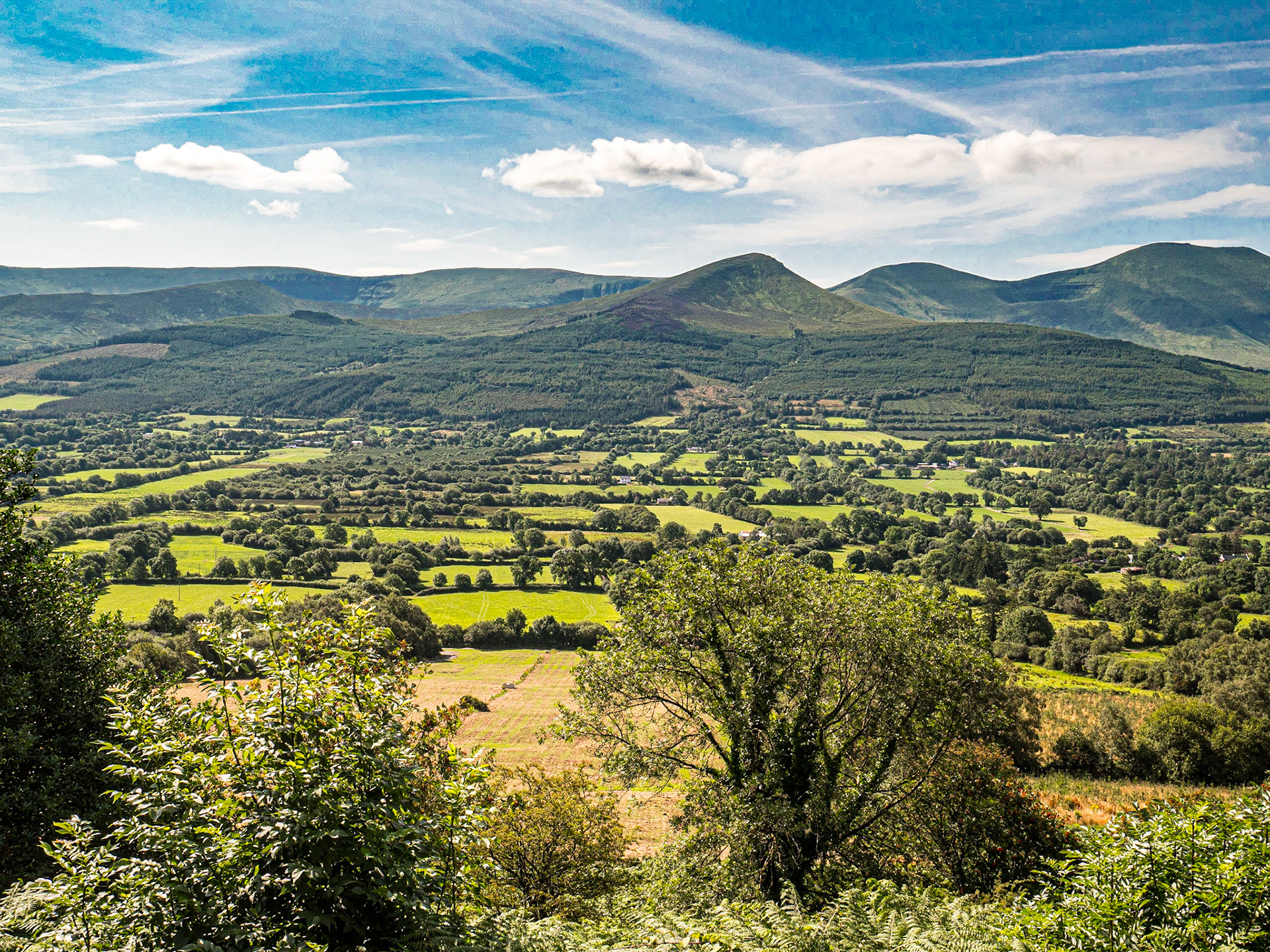 View of Glen of Aherlow from Christ the King statue, Co Tipperary, 1 Aug 2019