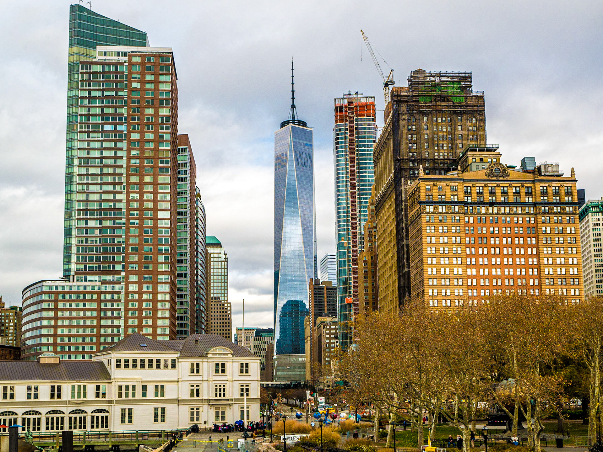 Downtown from boat for Liberty Island at Castle Clinton, Manhattan, 18 Nov 2015