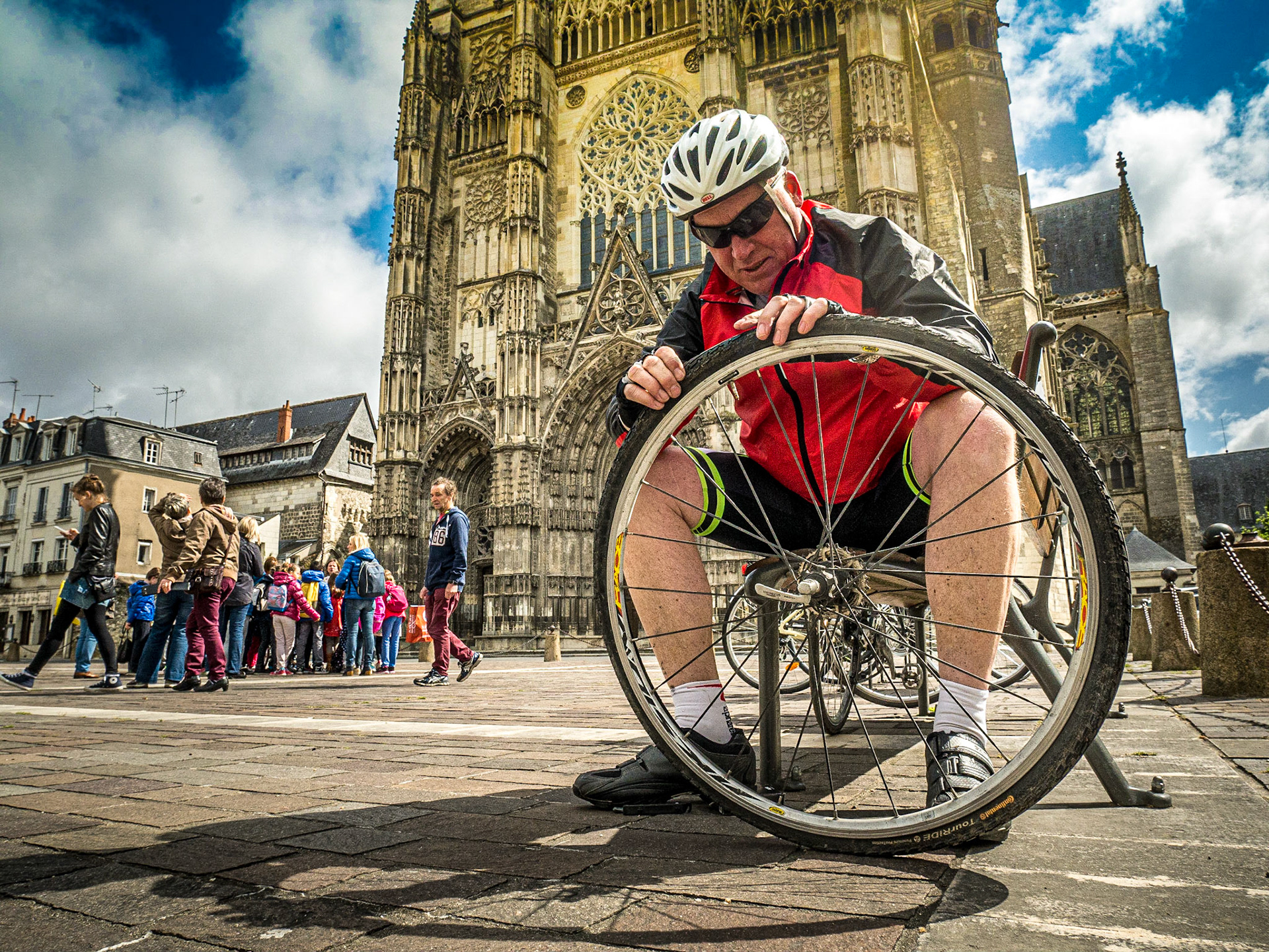 Fixing a puncture in front of Tours Cathedral, 19 May 2016