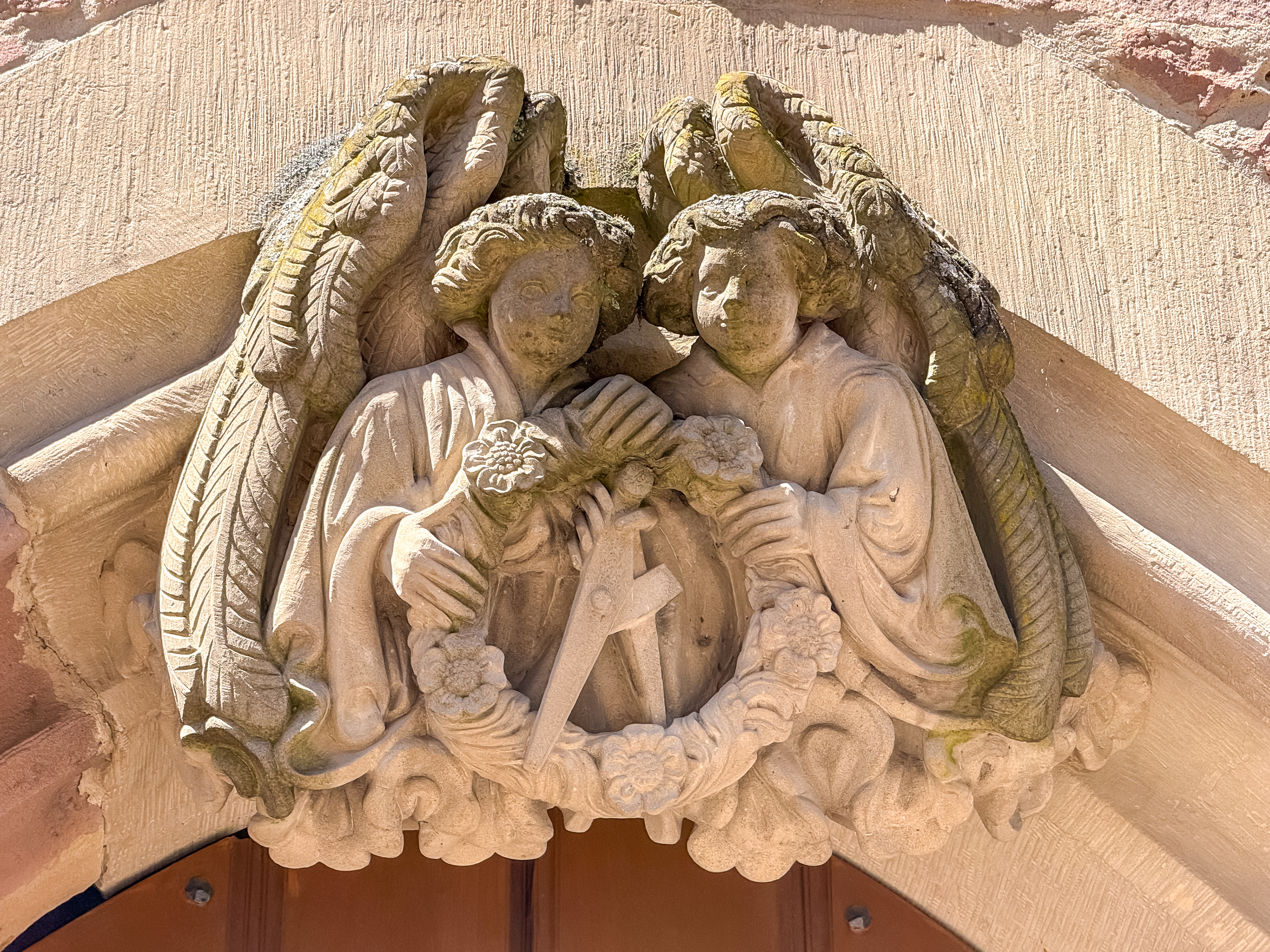 This is a memorial above one of the castle doors to honor a castle architect's two young sons who died while on the construction site.