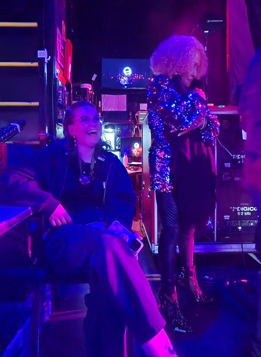 Awaiting her entrance.