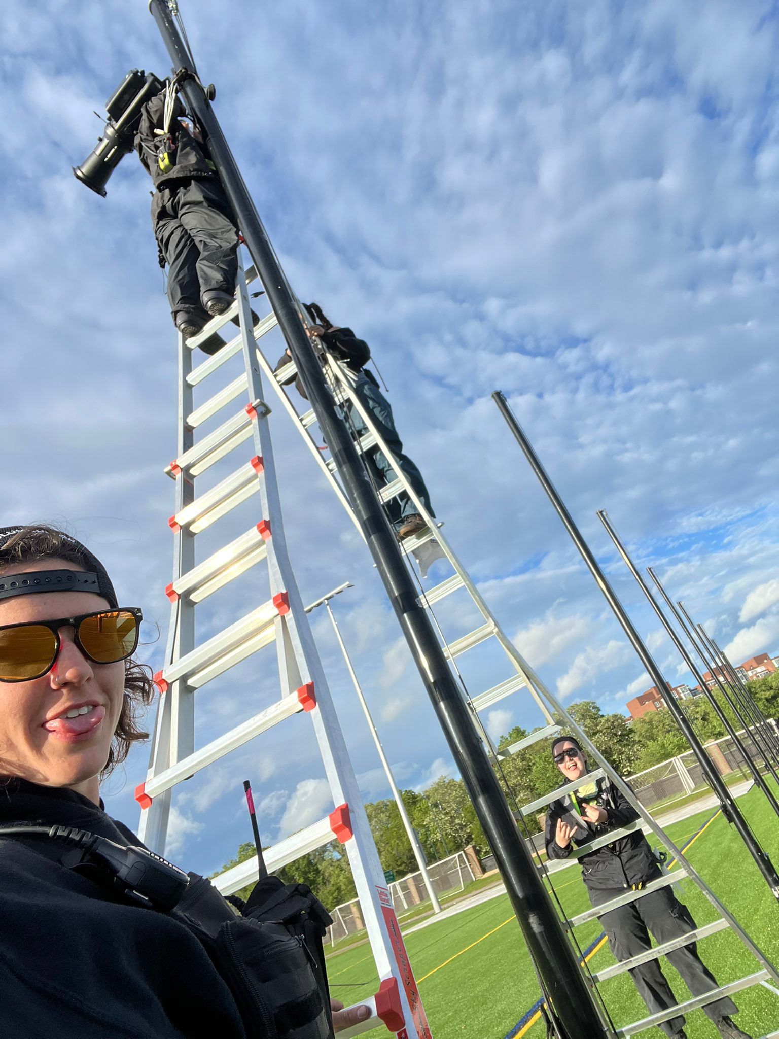Hanging lights on Mignone Field.